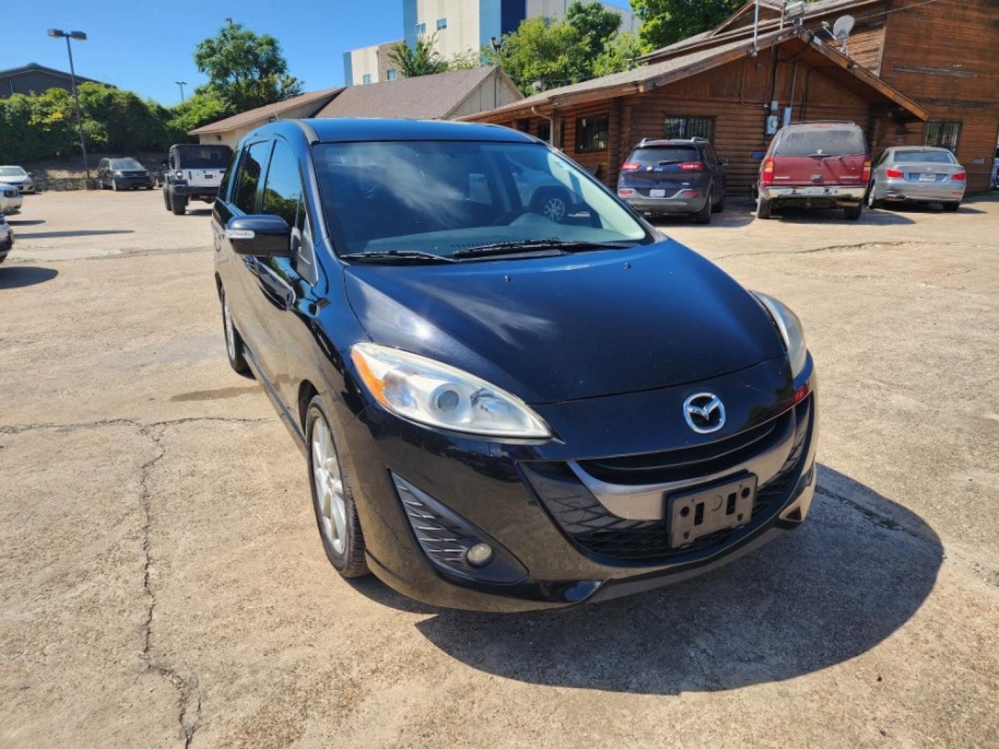 2015 Mazda MAZDA5 Touring (JM1CW2CL2F0) with an 2.5L L4 DOHC 16V engine, 5-Speed Automatic transmission, located at 301 S.first st, garland , TX, 75040, (972) 272-8878, 32.910500, -96.631042 - Photo#1