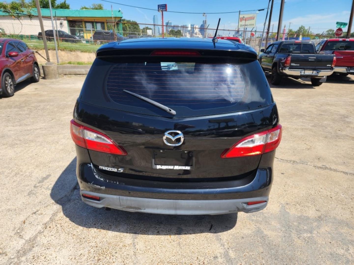 2015 Mazda MAZDA5 Touring (JM1CW2CL2F0) with an 2.5L L4 DOHC 16V engine, 5-Speed Automatic transmission, located at 301 S.first st, garland , TX, 75040, (972) 272-8878, 32.910500, -96.631042 - Photo#2