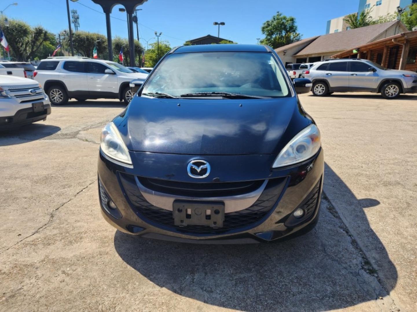 2015 Mazda MAZDA5 Touring (JM1CW2CL2F0) with an 2.5L L4 DOHC 16V engine, 5-Speed Automatic transmission, located at 301 S.first st, garland , TX, 75040, (972) 272-8878, 32.910500, -96.631042 - Photo#3