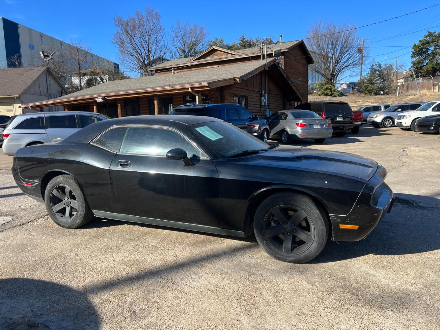 2009 Dodge Challenger SE (2B3LJ44VX9H) with an 3.5L V6 SOHC 24V engine, 4-Speed Automatic transmission, located at 945 E. Jefferson Blvd, Dallas, TX, 75203, (214) 943-7777, 32.752514, -96.811630 - Photo#2