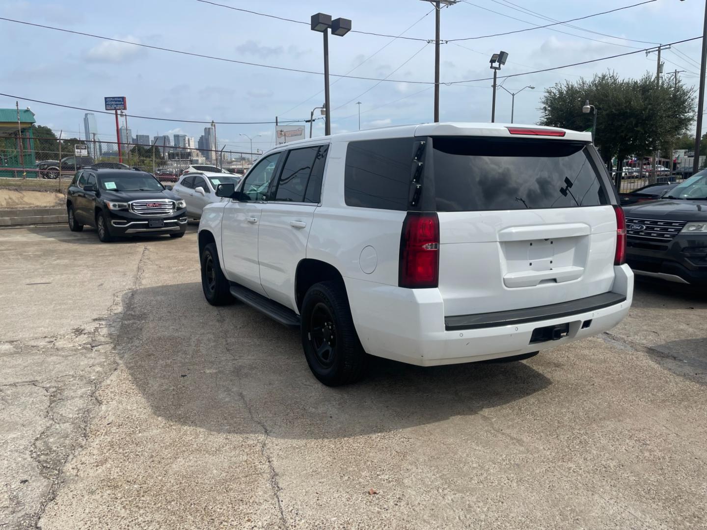 2018 white Chevrolet Tahoe Police 2WD (1GNLCDEC7JR) with an 5.3L V8 OHV 16V engine, 6A transmission, located at 945 E. Jefferson Blvd, Dallas, TX, 75203, (214) 943-7777, 32.752514, -96.811630 - Photo#1