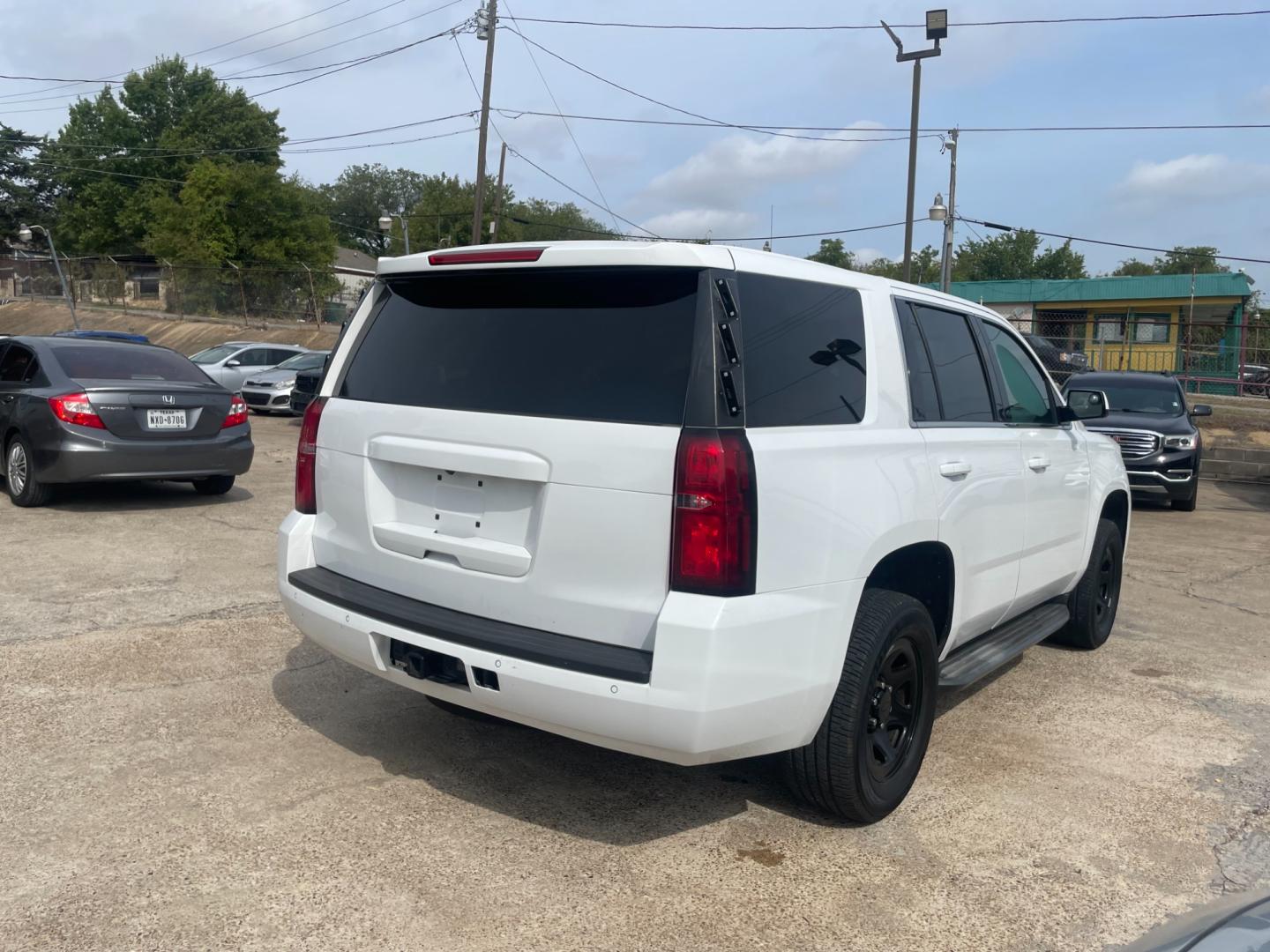 2018 white Chevrolet Tahoe Police 2WD (1GNLCDEC7JR) with an 5.3L V8 OHV 16V engine, 6A transmission, located at 945 E. Jefferson Blvd, Dallas, TX, 75203, (214) 943-7777, 32.752514, -96.811630 - Photo#2