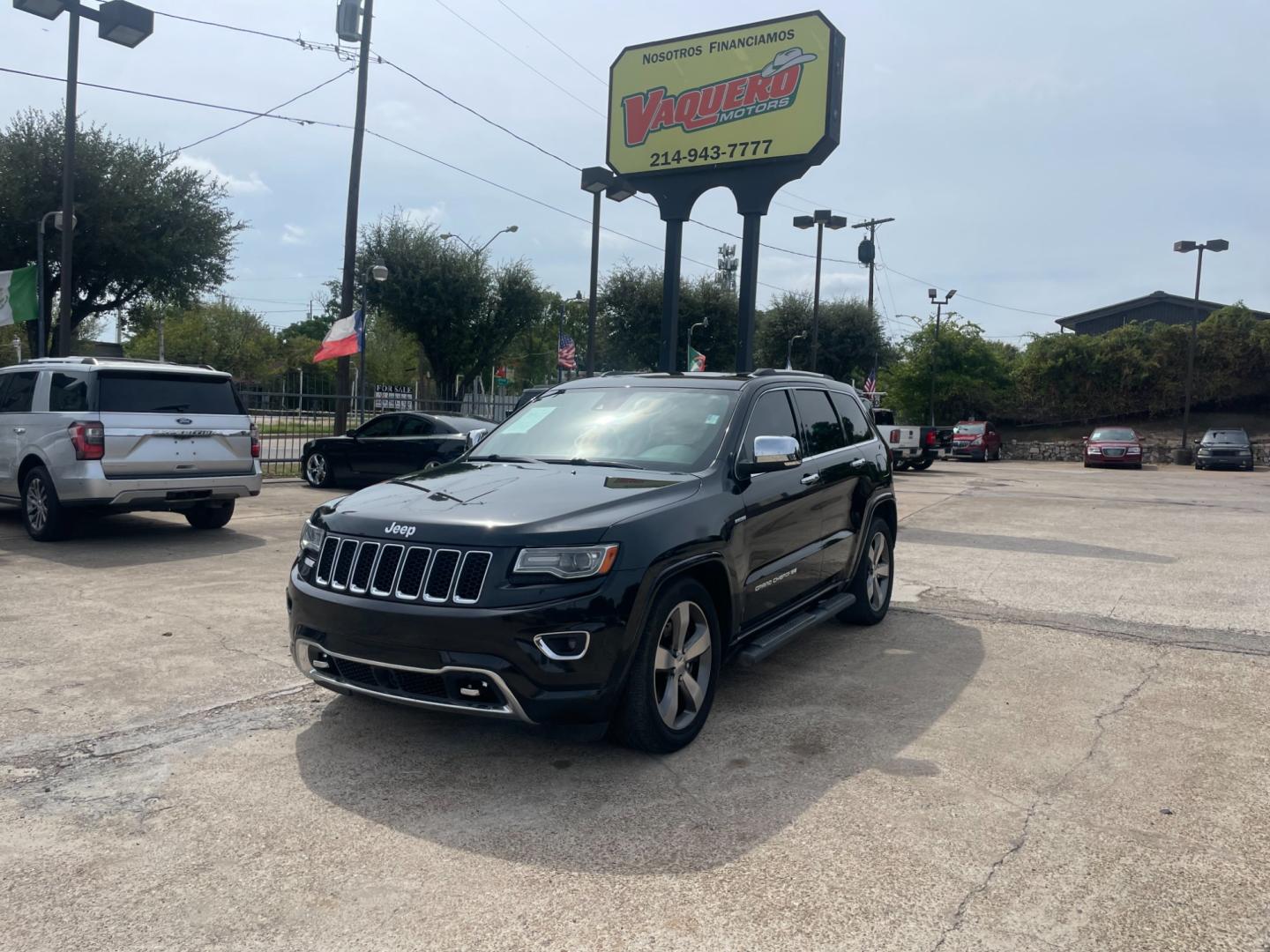 2014 Jeep Grand Cherokee Overland 4WD (1C4RJFCT9EC) with an 5.7L V8 OHV 16V engine, 5-Speed Automatic transmission, located at 945 E. Jefferson Blvd, Dallas, TX, 75203, (214) 943-7777, 32.752514, -96.811630 - Photo#0