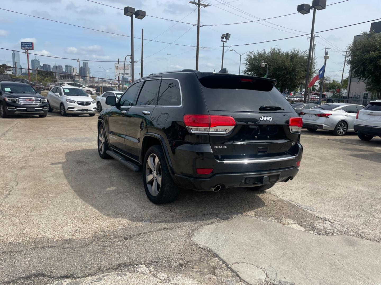 2014 Jeep Grand Cherokee Overland 4WD (1C4RJFCT9EC) with an 5.7L V8 OHV 16V engine, 5-Speed Automatic transmission, located at 945 E. Jefferson Blvd, Dallas, TX, 75203, (214) 943-7777, 32.752514, -96.811630 - Photo#1