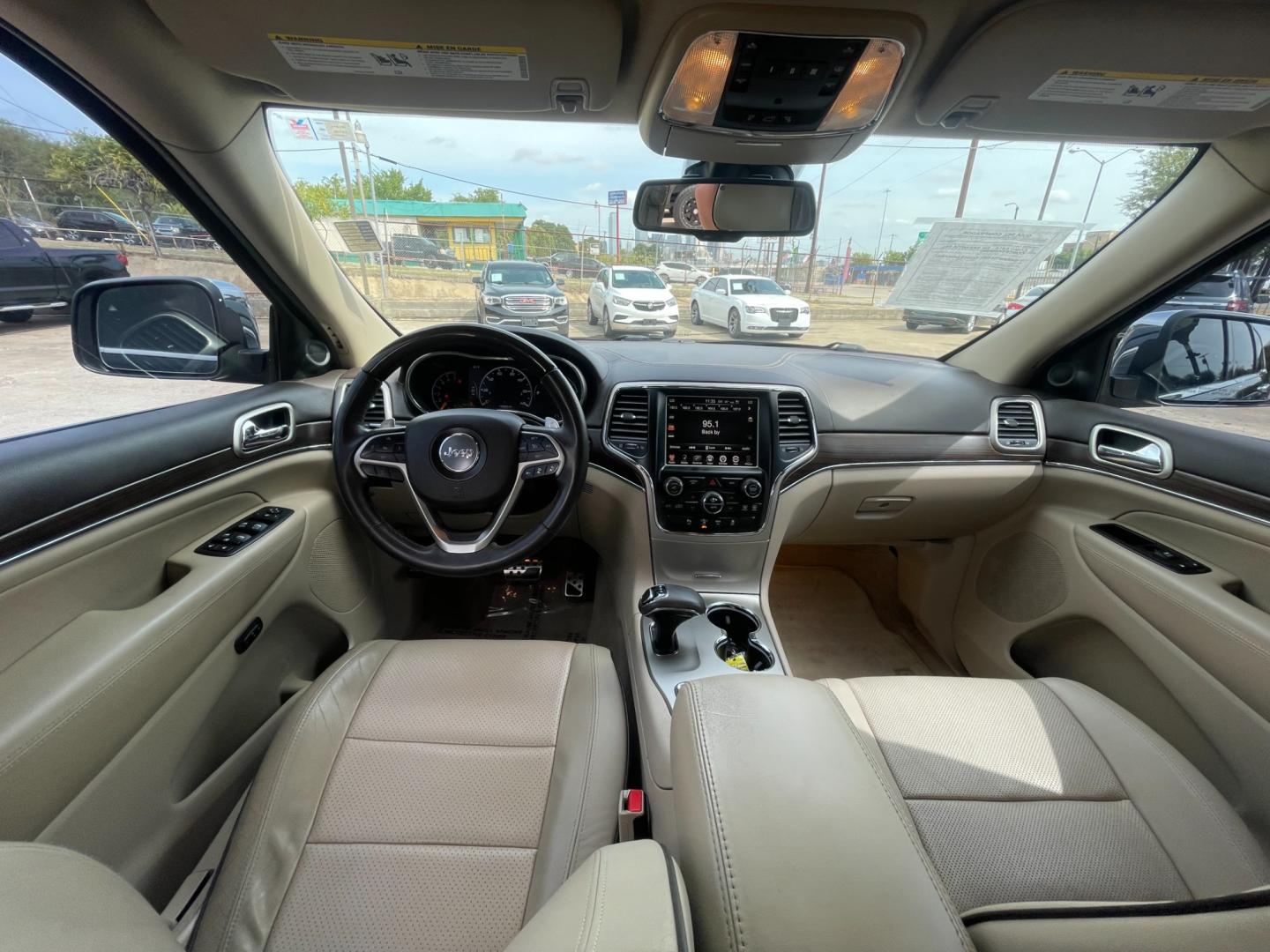 2014 Jeep Grand Cherokee Overland 4WD (1C4RJFCT9EC) with an 5.7L V8 OHV 16V engine, 5-Speed Automatic transmission, located at 945 E. Jefferson Blvd, Dallas, TX, 75203, (214) 943-7777, 32.752514, -96.811630 - Photo#4