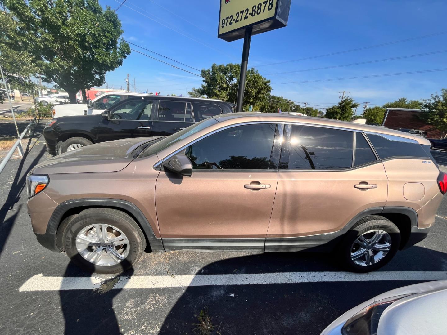 2018 Brown GMC Terrain SLE (3GKALMEV6JL) with an 1.4L L4 DOHC 16V TURBO engine, 6A transmission, located at 945 E. Jefferson Blvd, Dallas, TX, 75203, (214) 943-7777, 32.752514, -96.811630 - Photo#0