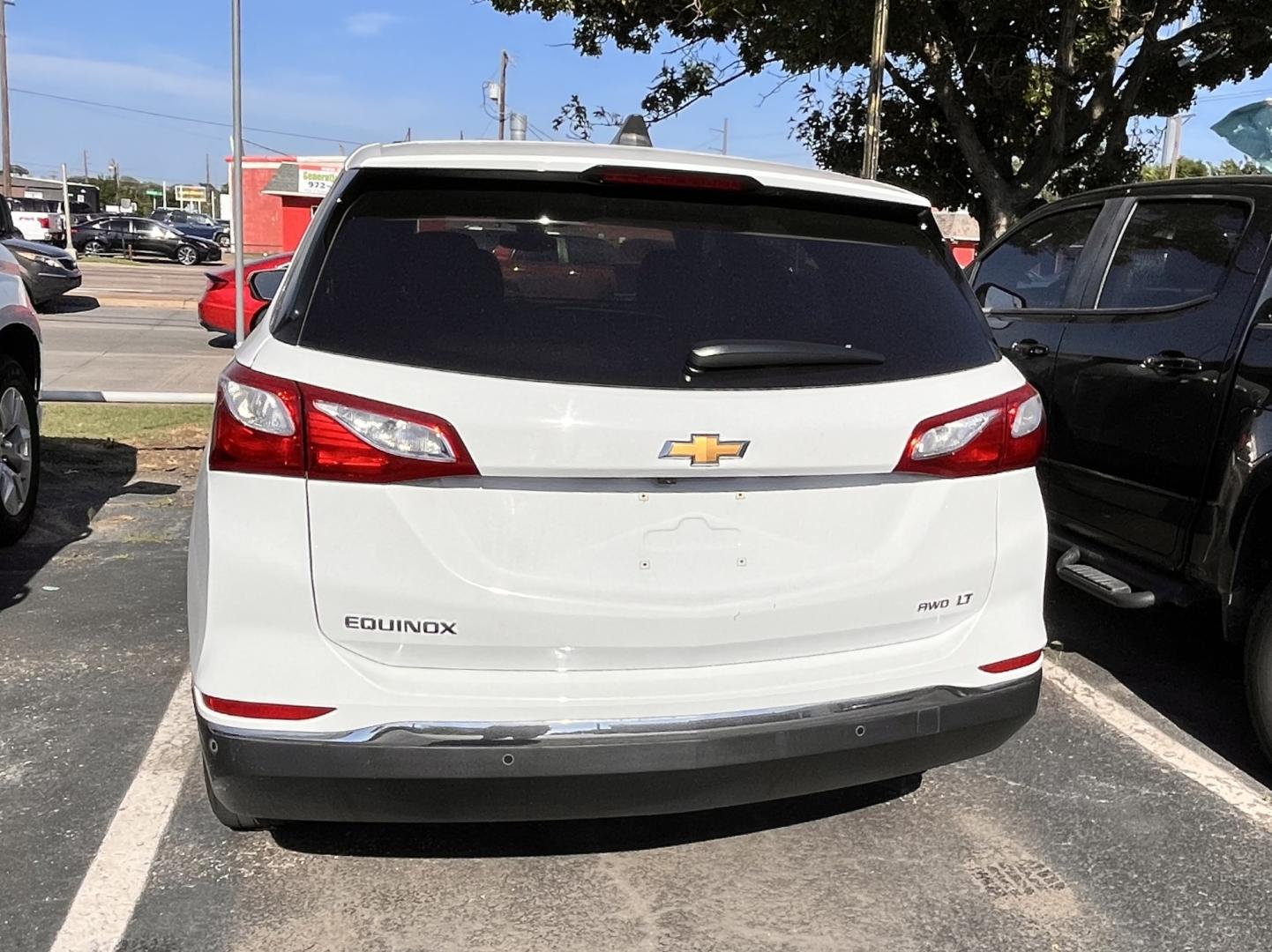 2019 white Chevrolet Equinox LT AWD (2GNAXTEV7K6) with an 1.5L L4 DOHC 16V TURBO engine, 6A transmission, located at 945 E. Jefferson Blvd, Dallas, TX, 75203, (214) 943-7777, 32.752514, -96.811630 - Photo#3