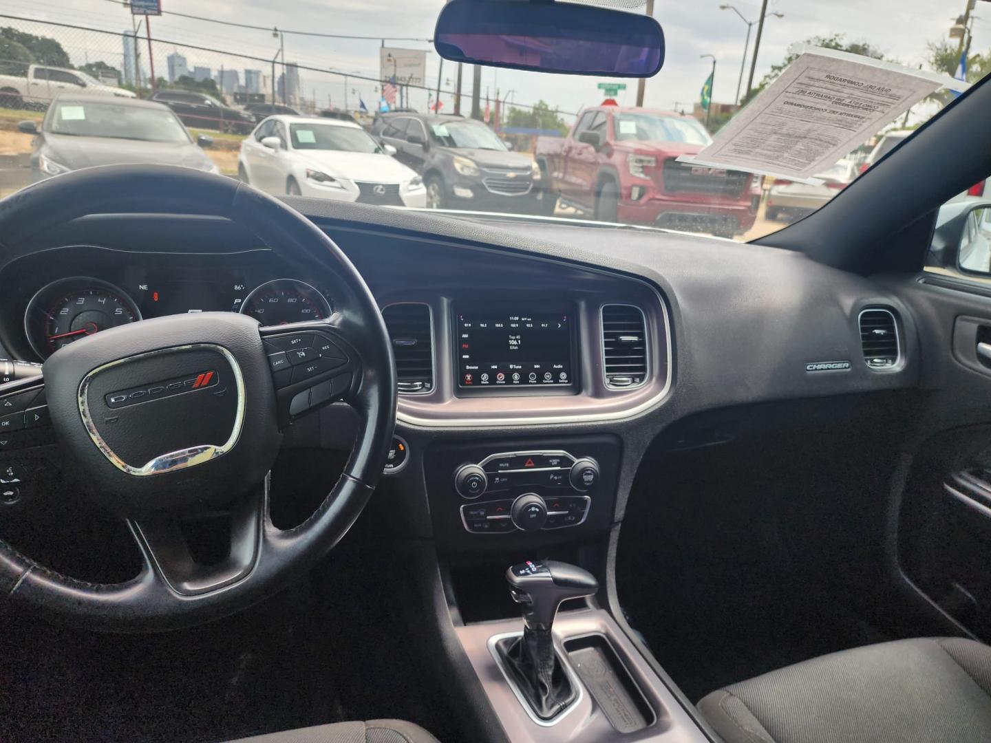 2019 white Dodge Charger SXT (2C3CDXBG9KH) with an 3.6L V6 DOHC 24V engine, 8A transmission, located at 945 E. Jefferson Blvd, Dallas, TX, 75203, (214) 943-7777, 32.752514, -96.811630 - Photo#4