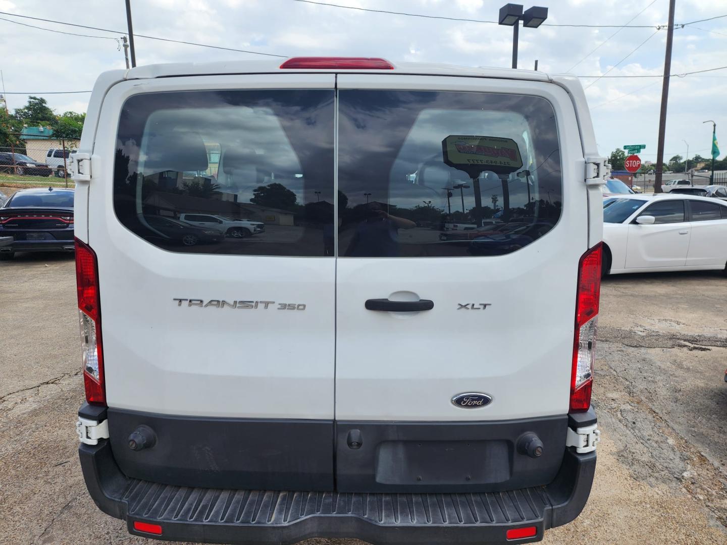 2017 white Ford Transit 350 Wagon Low Roof XLT 60/40 Pass. 148-in. WB (1FBZX2ZM5HK) with an 3.7L V6 DOHC 24V engine, 6A transmission, located at 945 E. Jefferson Blvd, Dallas, TX, 75203, (214) 943-7777, 32.752514, -96.811630 - Photo#3