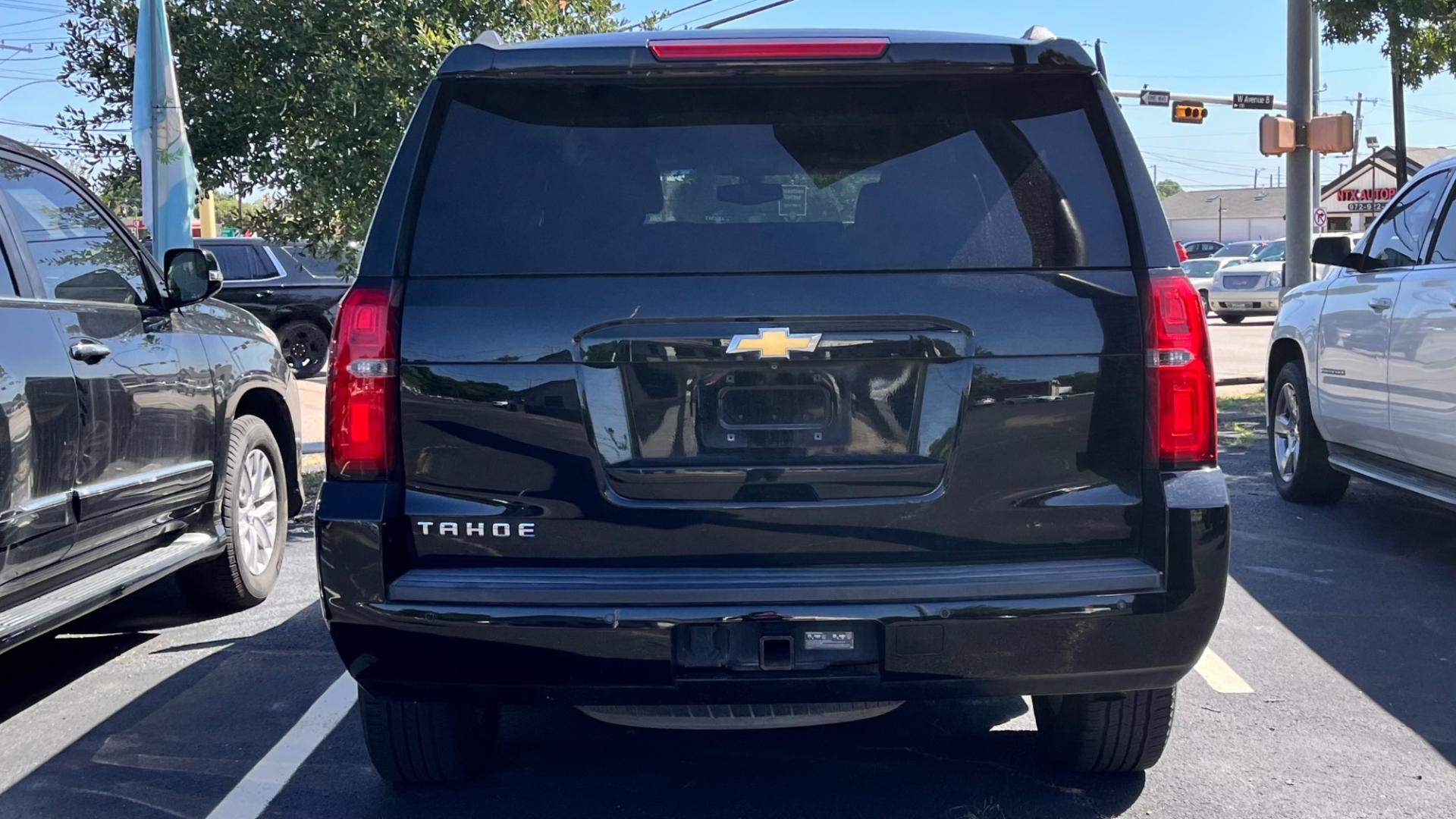 2015 Black Chevrolet Tahoe LS 2WD (1GNSCAKC2FR) with an 5.3L V8 OHV 16V engine, 6-Speed Automatic transmission, located at 945 E. Jefferson Blvd, Dallas, TX, 75203, (214) 943-7777, 32.752514, -96.811630 - Photo#3