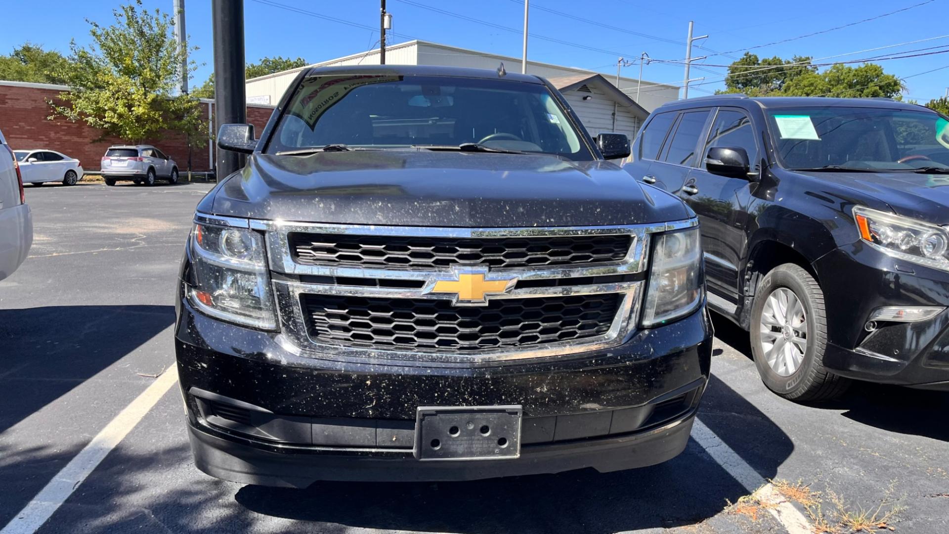 2015 Black Chevrolet Tahoe LS 2WD (1GNSCAKC2FR) with an 5.3L V8 OHV 16V engine, 6-Speed Automatic transmission, located at 945 E. Jefferson Blvd, Dallas, TX, 75203, (214) 943-7777, 32.752514, -96.811630 - Photo#1