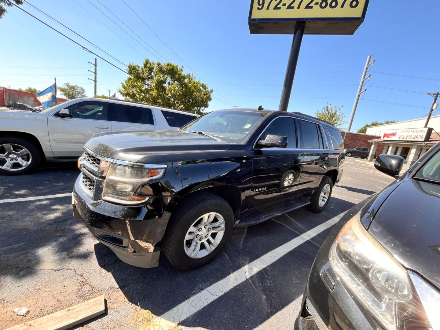 2015 Black Chevrolet Tahoe LS 2WD (1GNSCAKC2FR) with an 5.3L V8 OHV 16V engine, 6-Speed Automatic transmission, located at 945 E. Jefferson Blvd, Dallas, TX, 75203, (214) 943-7777, 32.752514, -96.811630 - Photo#0