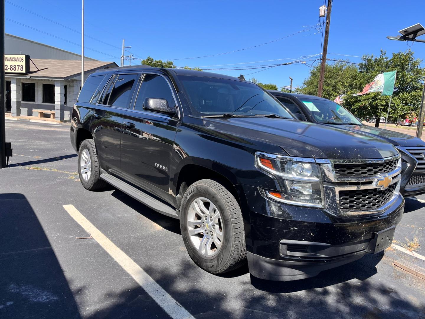 2015 Black Chevrolet Tahoe LS 2WD (1GNSCAKC2FR) with an 5.3L V8 OHV 16V engine, 6-Speed Automatic transmission, located at 945 E. Jefferson Blvd, Dallas, TX, 75203, (214) 943-7777, 32.752514, -96.811630 - Photo#2