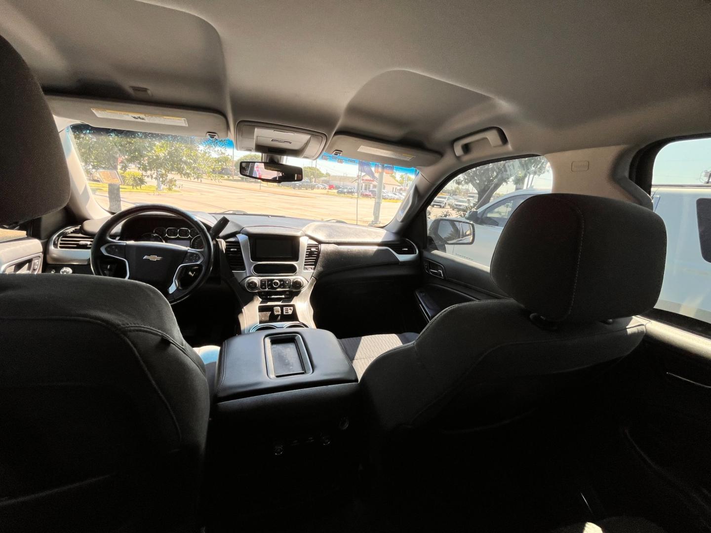 2015 Black Chevrolet Tahoe LS 2WD (1GNSCAKC2FR) with an 5.3L V8 OHV 16V engine, 6-Speed Automatic transmission, located at 945 E. Jefferson Blvd, Dallas, TX, 75203, (214) 943-7777, 32.752514, -96.811630 - Photo#4