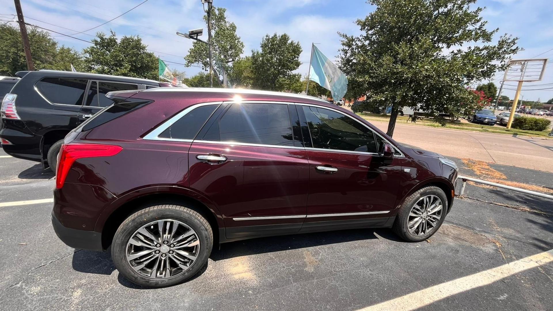 2017 Maroon Cadillac XT5 (1GYKNERS2HZ) , located at 945 E. Jefferson Blvd, Dallas, TX, 75203, (214) 943-7777, 32.752514, -96.811630 - Photo#2