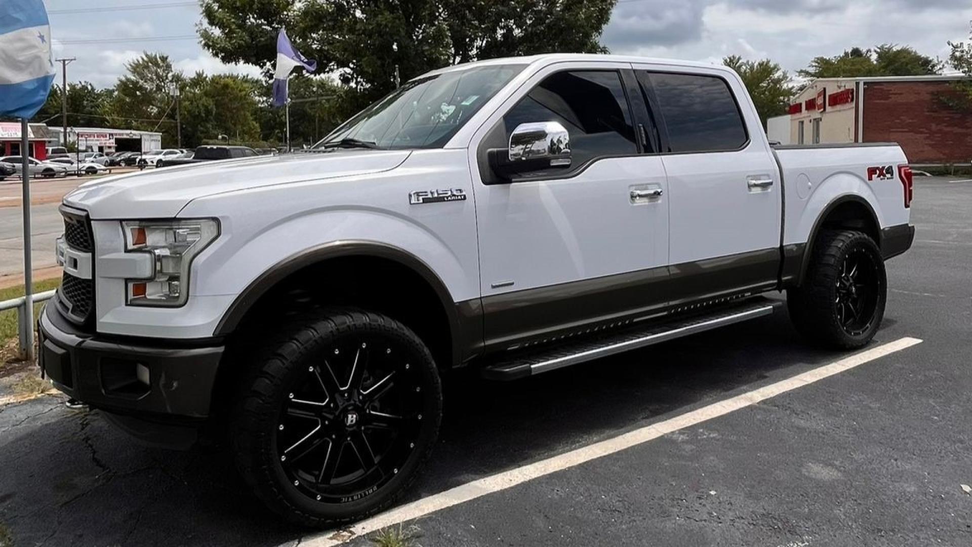 2015 white Ford F-150 (1FTEW1EG0FK) , located at 945 E. Jefferson Blvd, Dallas, TX, 75203, (214) 943-7777, 32.752514, -96.811630 - Photo#0