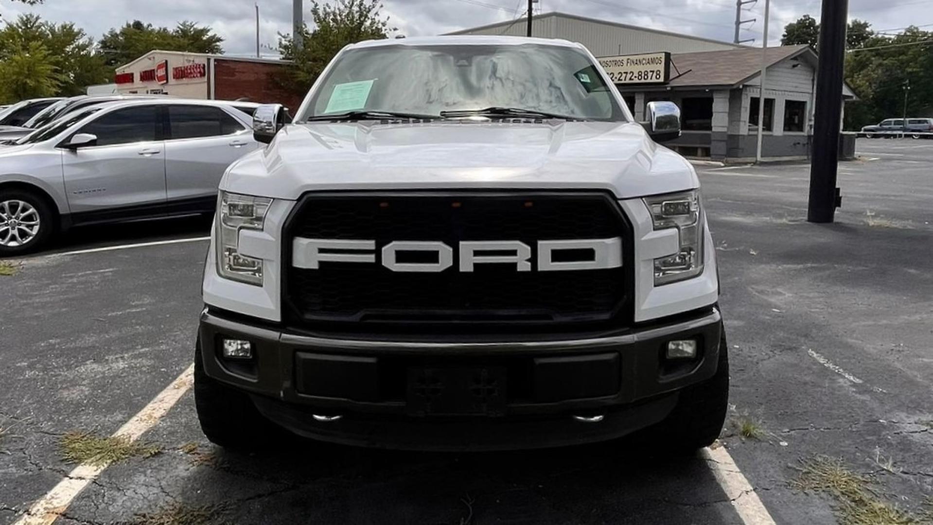 2015 white Ford F-150 (1FTEW1EG0FK) , located at 945 E. Jefferson Blvd, Dallas, TX, 75203, (214) 943-7777, 32.752514, -96.811630 - Photo#1