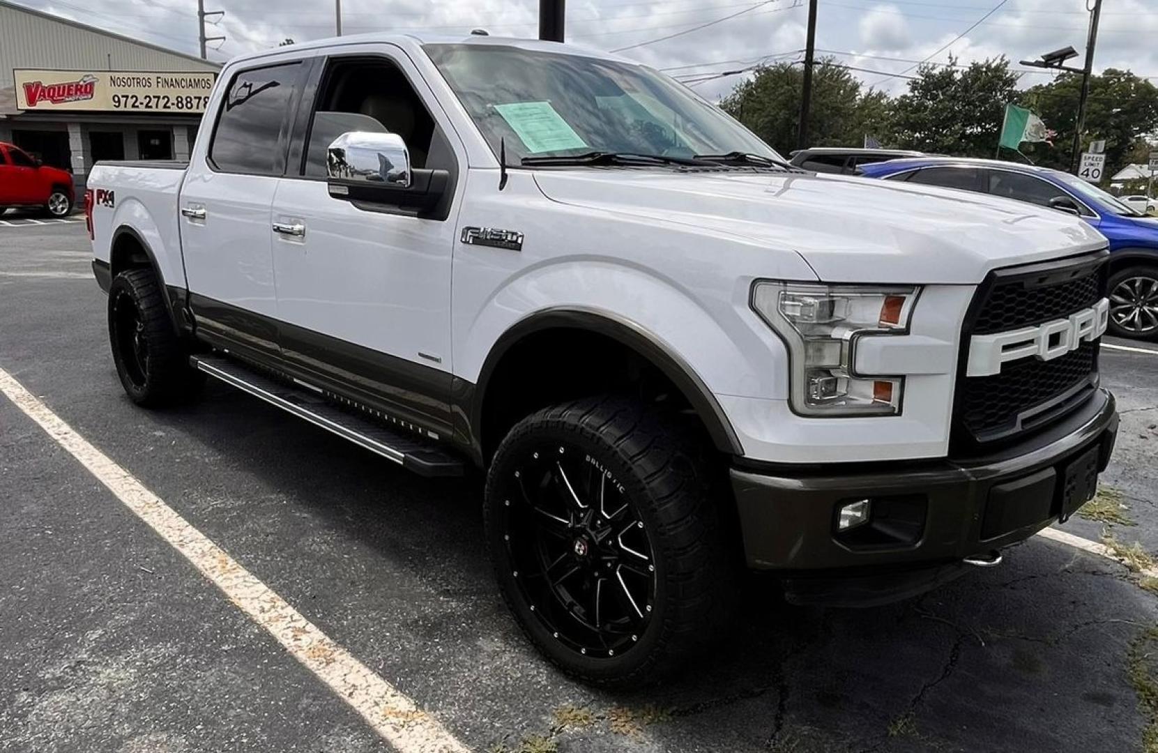 2015 white Ford F-150 (1FTEW1EG0FK) , located at 945 E. Jefferson Blvd, Dallas, TX, 75203, (214) 943-7777, 32.752514, -96.811630 - Photo#2