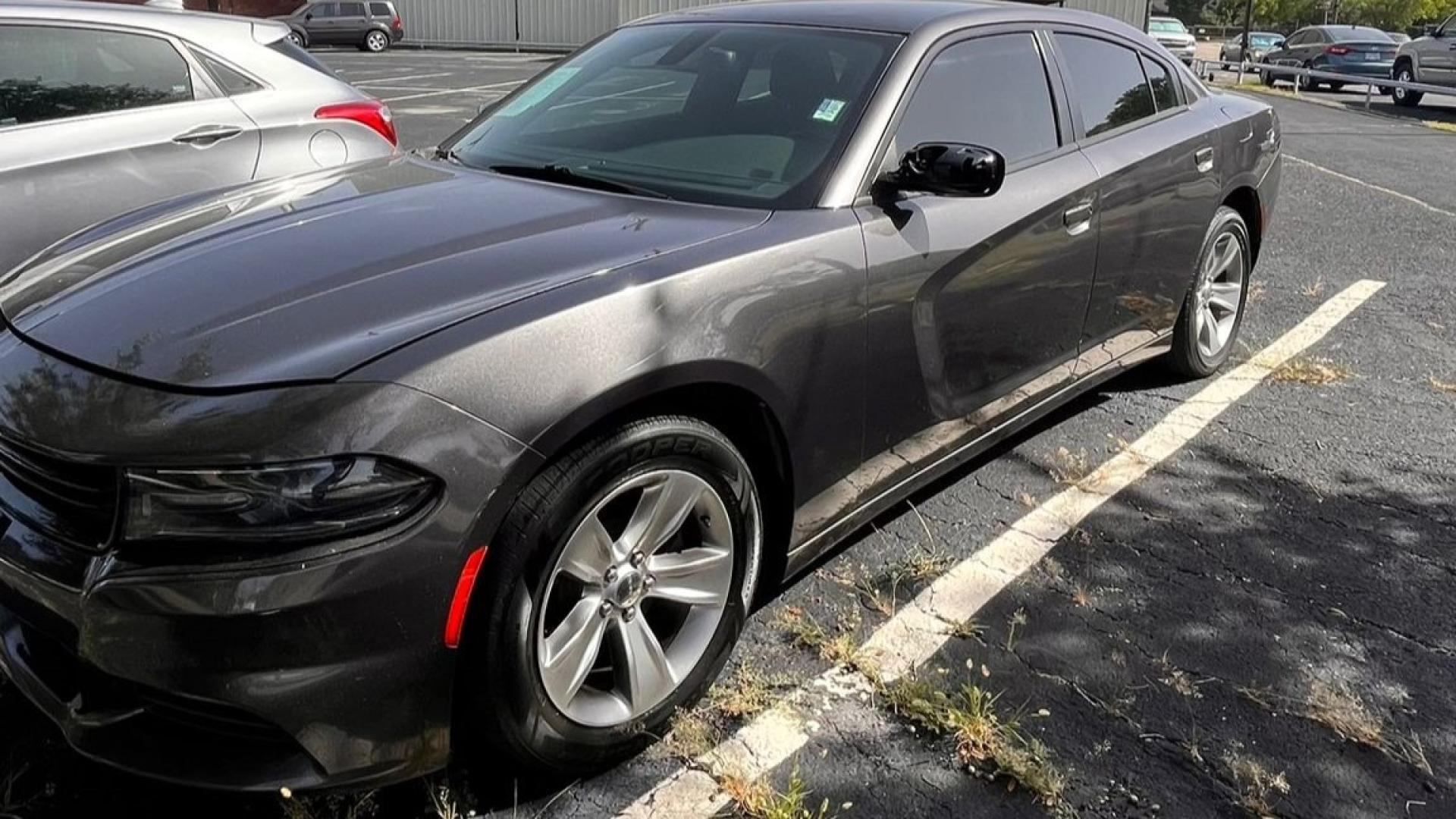 2016 Gray Dodge Charger SXT (2C3CDXHG8GH) with an 3.6L V6 DOHC 24V engine, 8A transmission, located at 945 E. Jefferson Blvd, Dallas, TX, 75203, (214) 943-7777, 32.752514, -96.811630 - Photo#0