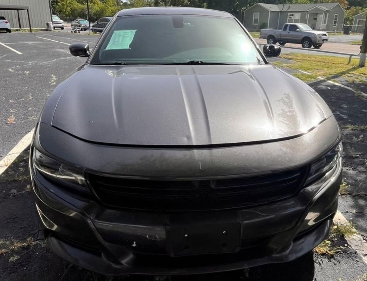 2016 Gray Dodge Charger SXT (2C3CDXHG8GH) with an 3.6L V6 DOHC 24V engine, 8A transmission, located at 945 E. Jefferson Blvd, Dallas, TX, 75203, (214) 943-7777, 32.752514, -96.811630 - Photo#1