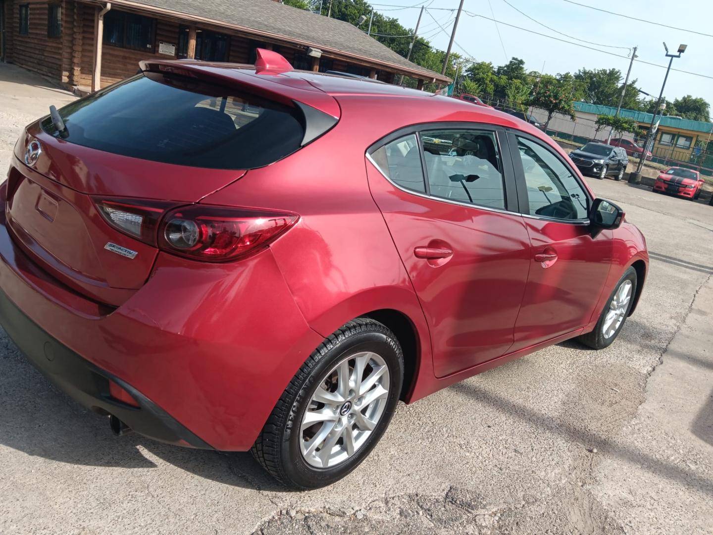 2014 Mazda MAZDA3 i Grand Touring AT 5-Door (JM1BM1M76E1) with an 2.0L L4 DOHC 16V engine, 6-Speed Automatic transmission, located at 945 E. Jefferson Blvd, Dallas, TX, 75203, (214) 943-7777, 32.752514, -96.811630 - Photo#2