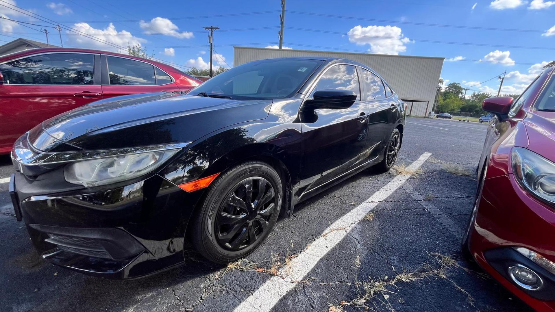 2016 Honda Civic LX Sedan CVT (19XFC2F5XGE) with an 2.0L L4 DOHC 16V engine, CVT transmission, located at 945 E. Jefferson Blvd, Dallas, TX, 75203, (214) 943-7777, 32.752514, -96.811630 - Photo#0