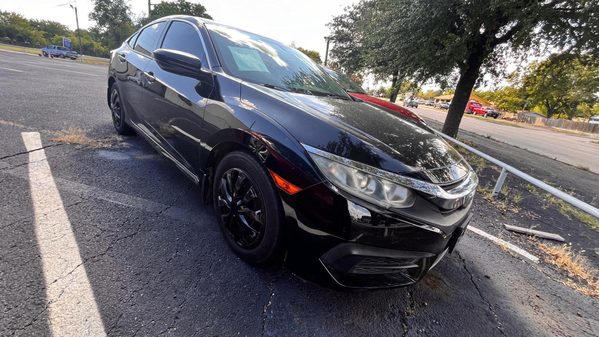 2016 Honda Civic LX Sedan CVT (19XFC2F5XGE) with an 2.0L L4 DOHC 16V engine, CVT transmission, located at 945 E. Jefferson Blvd, Dallas, TX, 75203, (214) 943-7777, 32.752514, -96.811630 - Photo#2