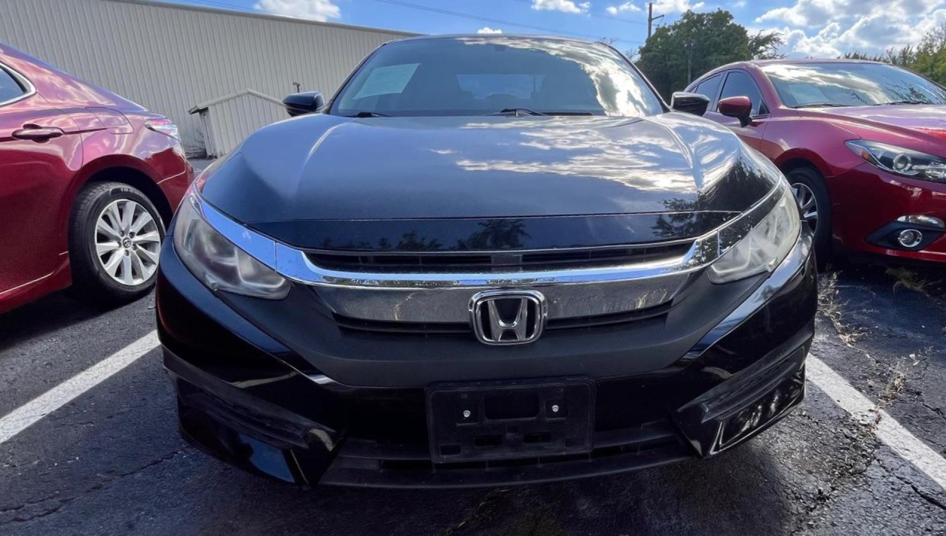 2016 Honda Civic LX Sedan CVT (19XFC2F5XGE) with an 2.0L L4 DOHC 16V engine, CVT transmission, located at 945 E. Jefferson Blvd, Dallas, TX, 75203, (214) 943-7777, 32.752514, -96.811630 - Photo#1