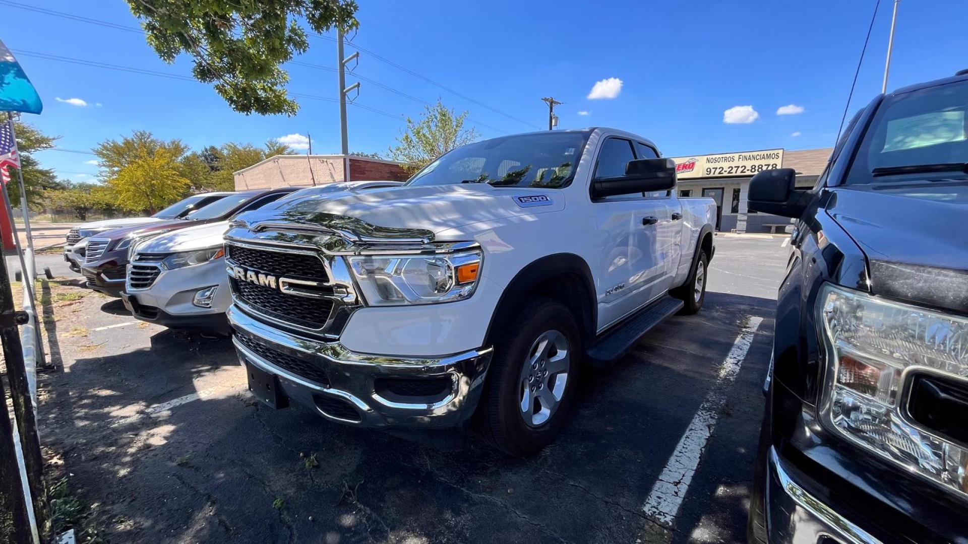 2019 white RAM 1500 Tradesman Quad Cab 4WD (1C6RRFCG4KN) with an 3.6L V6 DOHC 24V engine, 8A transmission, located at 945 E. Jefferson Blvd, Dallas, TX, 75203, (214) 943-7777, 32.752514, -96.811630 - Photo#0