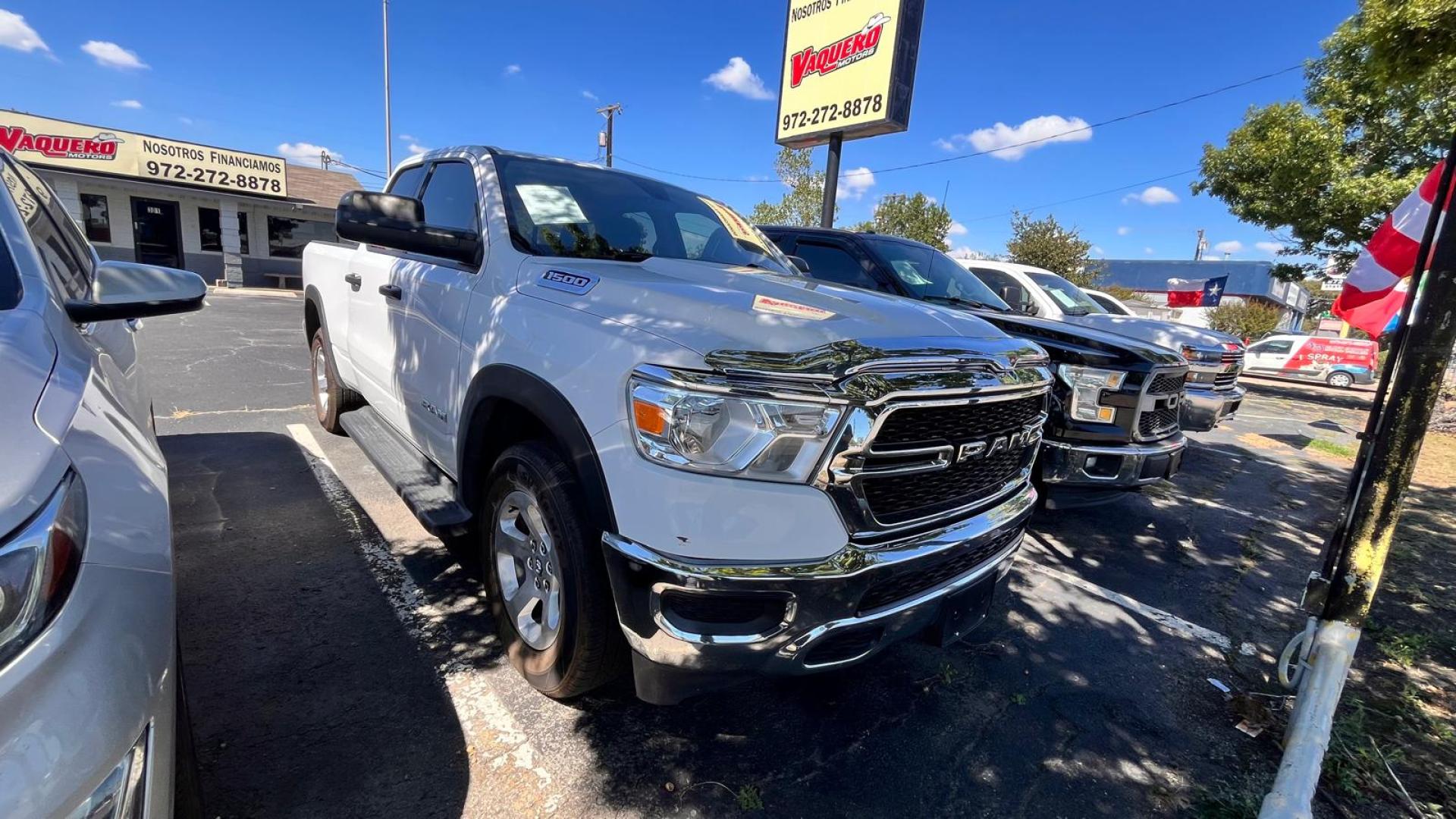 2019 white RAM 1500 Tradesman Quad Cab 4WD (1C6RRFCG4KN) with an 3.6L V6 DOHC 24V engine, 8A transmission, located at 945 E. Jefferson Blvd, Dallas, TX, 75203, (214) 943-7777, 32.752514, -96.811630 - Photo#2