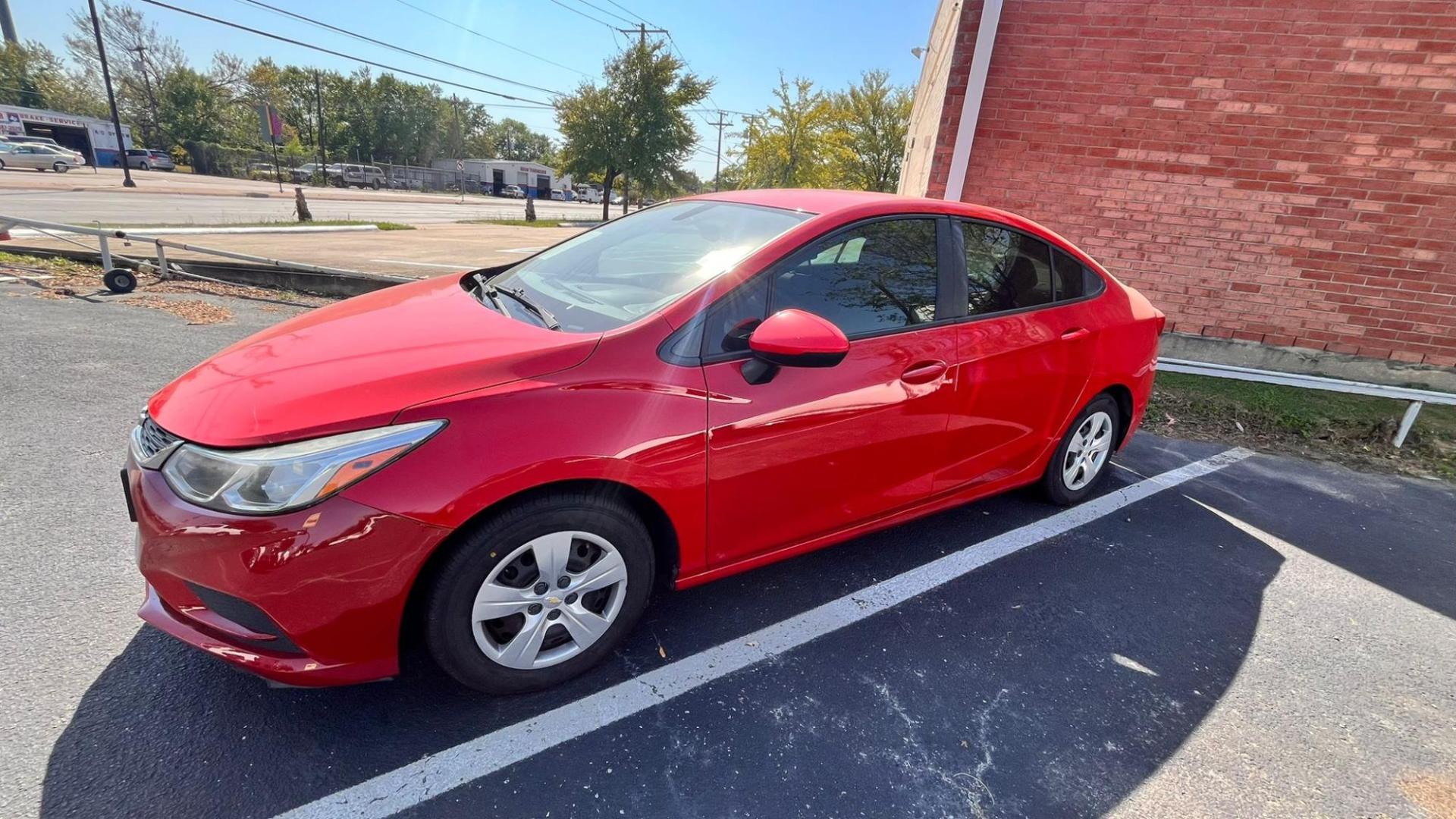 2017 Red Chevrolet Cruze LS Auto (3G1BC5SM2HS) with an 1.4L L4 DOHC 16V TURBO engine, 6A transmission, located at 945 E. Jefferson Blvd, Dallas, TX, 75203, (214) 943-7777, 32.752514, -96.811630 - Photo#0