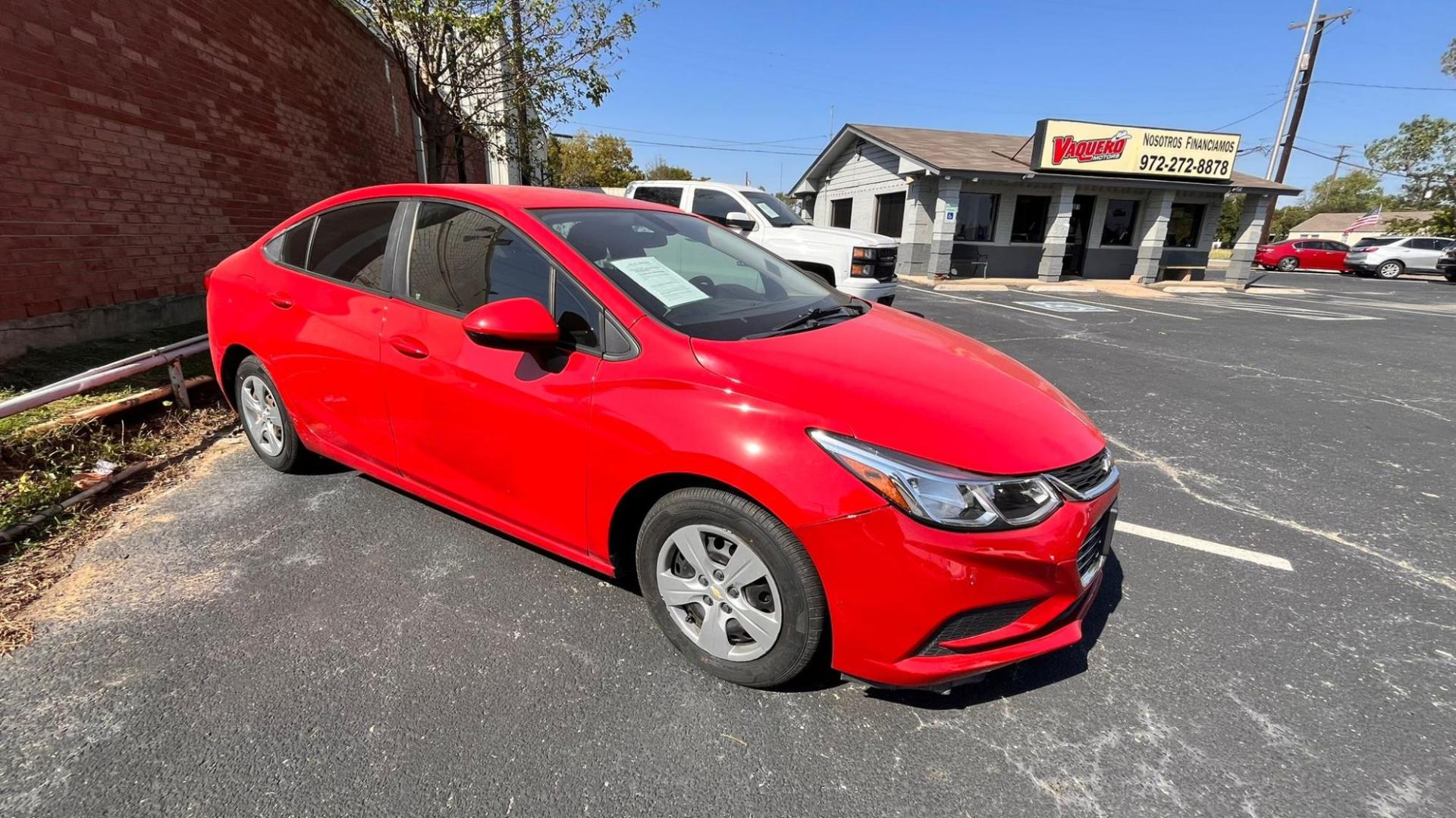 2017 Red Chevrolet Cruze LS Auto (3G1BC5SM2HS) with an 1.4L L4 DOHC 16V TURBO engine, 6A transmission, located at 945 E. Jefferson Blvd, Dallas, TX, 75203, (214) 943-7777, 32.752514, -96.811630 - Photo#2