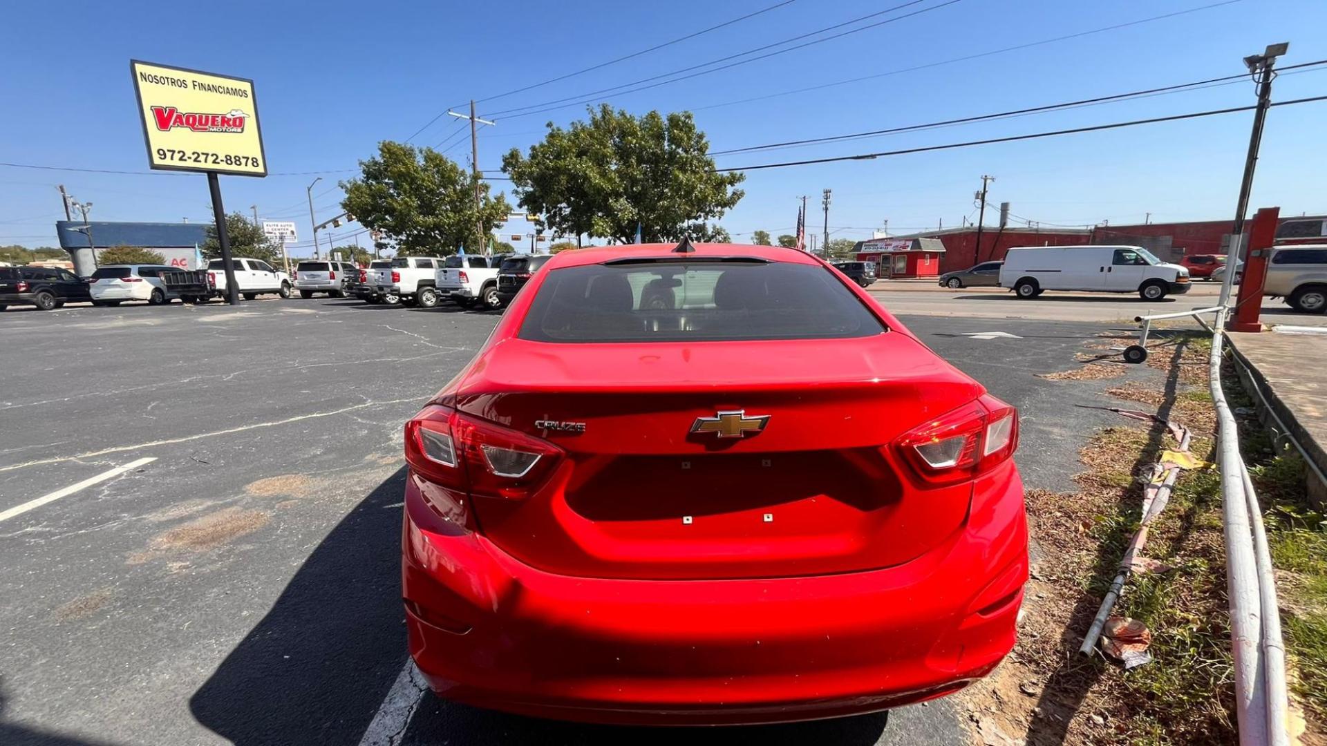 2017 Red Chevrolet Cruze LS Auto (3G1BC5SM2HS) with an 1.4L L4 DOHC 16V TURBO engine, 6A transmission, located at 945 E. Jefferson Blvd, Dallas, TX, 75203, (214) 943-7777, 32.752514, -96.811630 - Photo#3