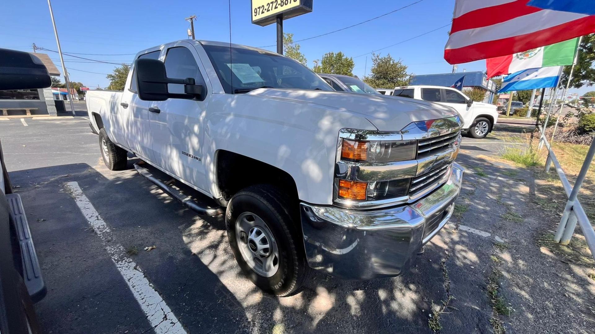 2019 white Chevrolet Silverado 2500HD Work Truck 2WD (1GC1CREG7KF) with an 6.0L V8 OHV 16V FFV engine, 6A transmission, located at 945 E. Jefferson Blvd, Dallas, TX, 75203, (214) 943-7777, 32.752514, -96.811630 - Photo#2