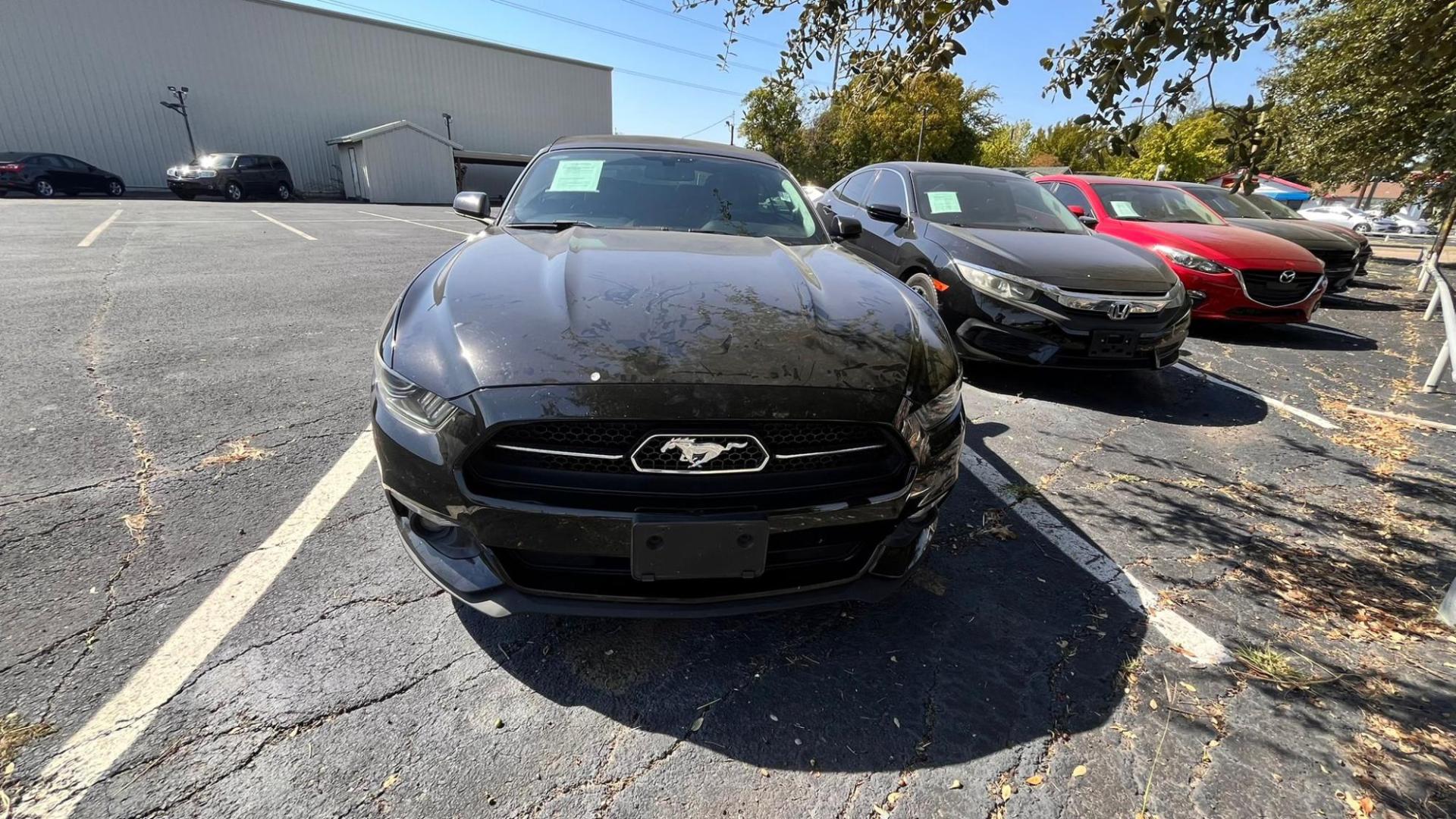 2015 Black Ford Mustang EcoBoost Premium Convertible (1FATP8UH0F5) with an 2.3L L4 DOHC 16V engine, located at 945 E. Jefferson Blvd, Dallas, TX, 75203, (214) 943-7777, 32.752514, -96.811630 - Photo#1