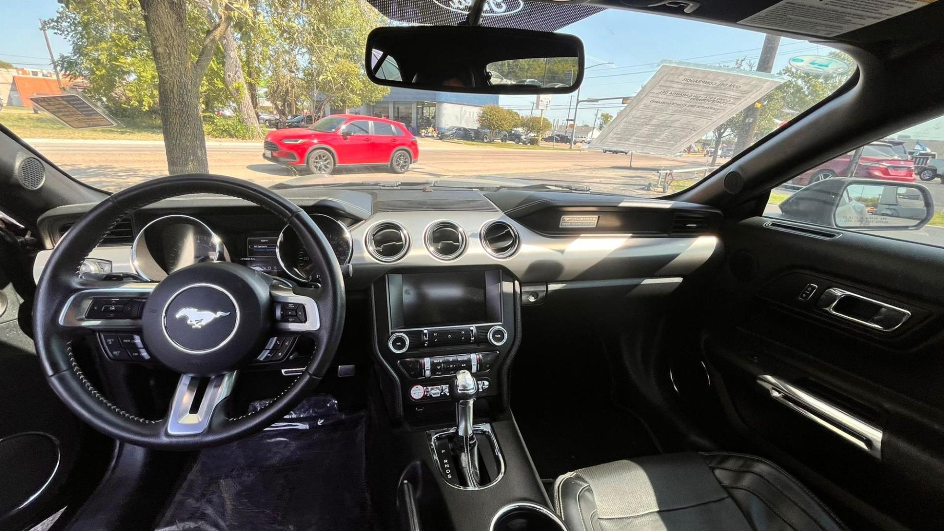 2015 Black Ford Mustang EcoBoost Premium Convertible (1FATP8UH0F5) with an 2.3L L4 DOHC 16V engine, located at 945 E. Jefferson Blvd, Dallas, TX, 75203, (214) 943-7777, 32.752514, -96.811630 - Photo#4