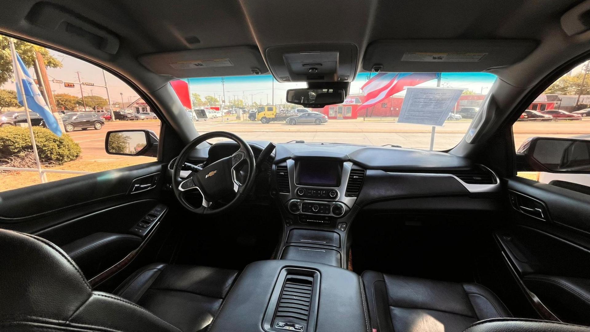 2017 Red Chevrolet Tahoe Premier 2WD (1GNSCCKC3HR) with an 5.3L V8 OHV 16V engine, 6A transmission, located at 945 E. Jefferson Blvd, Dallas, TX, 75203, (214) 943-7777, 32.752514, -96.811630 - Photo#4