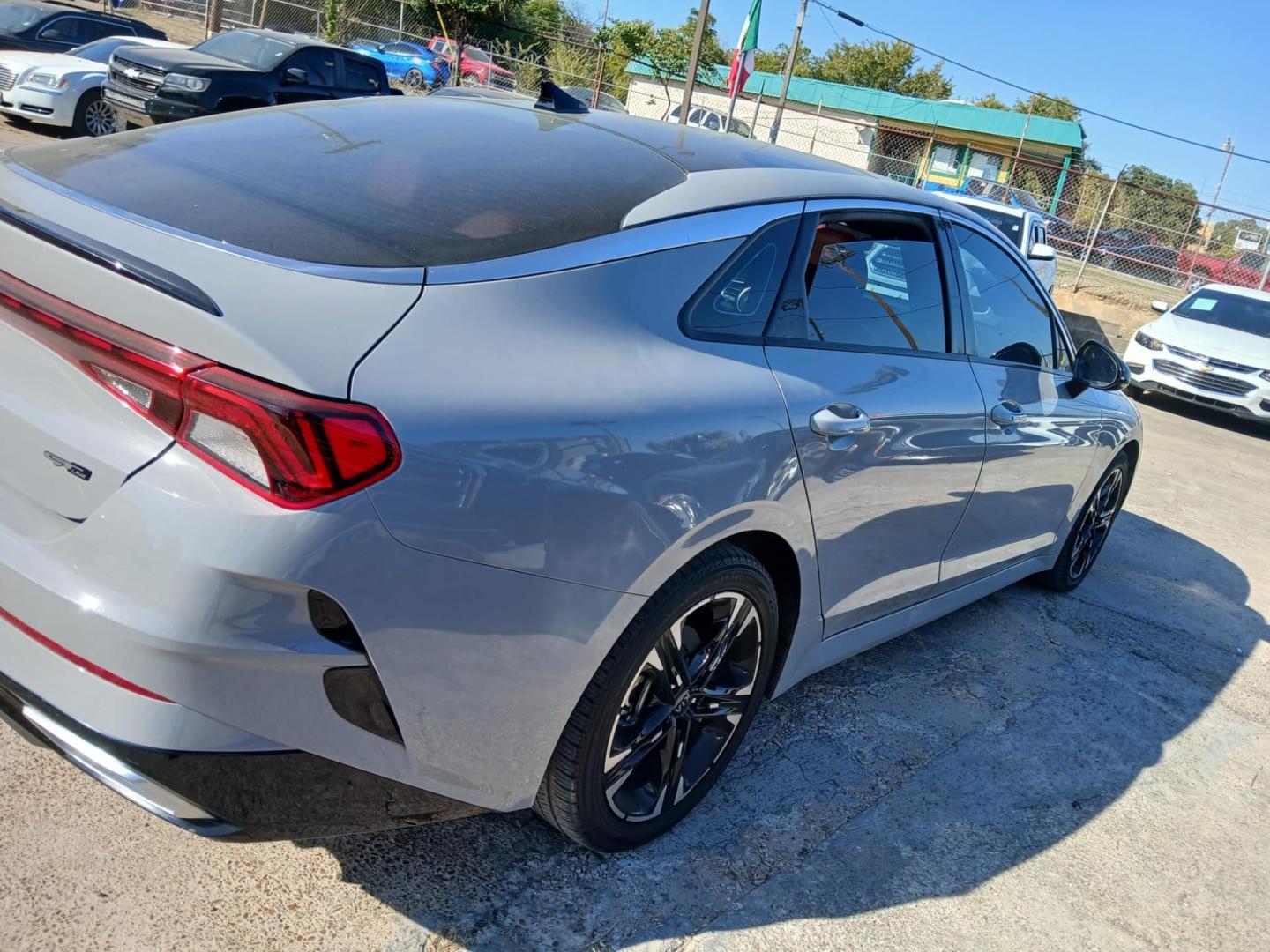 2021 Gray Kia K5 GT-Line (5XXG64J24MG) , located at 945 E. Jefferson Blvd, Dallas, TX, 75203, (214) 943-7777, 32.752514, -96.811630 - Photo#2