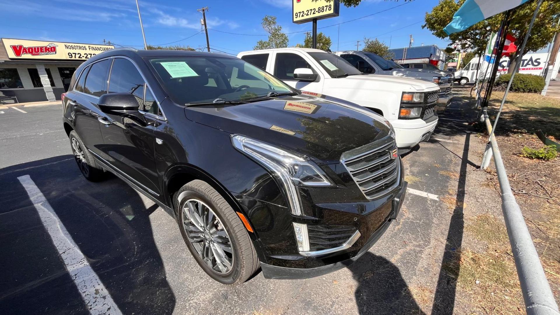 2017 Black Cadillac XT5 Luxury AWD (1GYKNCRS7HZ) with an 3.6L V6 DOHC 24V engine, 8A transmission, located at 945 E. Jefferson Blvd, Dallas, TX, 75203, (214) 943-7777, 32.752514, -96.811630 - Photo#2