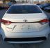 2020 white Toyota Corolla LE (JTDEPRAE6LJ) with an 1.8L L4 DOHC 16V engine, CVT transmission, located at 945 E. Jefferson Blvd, Dallas, TX, 75203, (214) 943-7777, 32.752514, -96.811630 - Photo#4