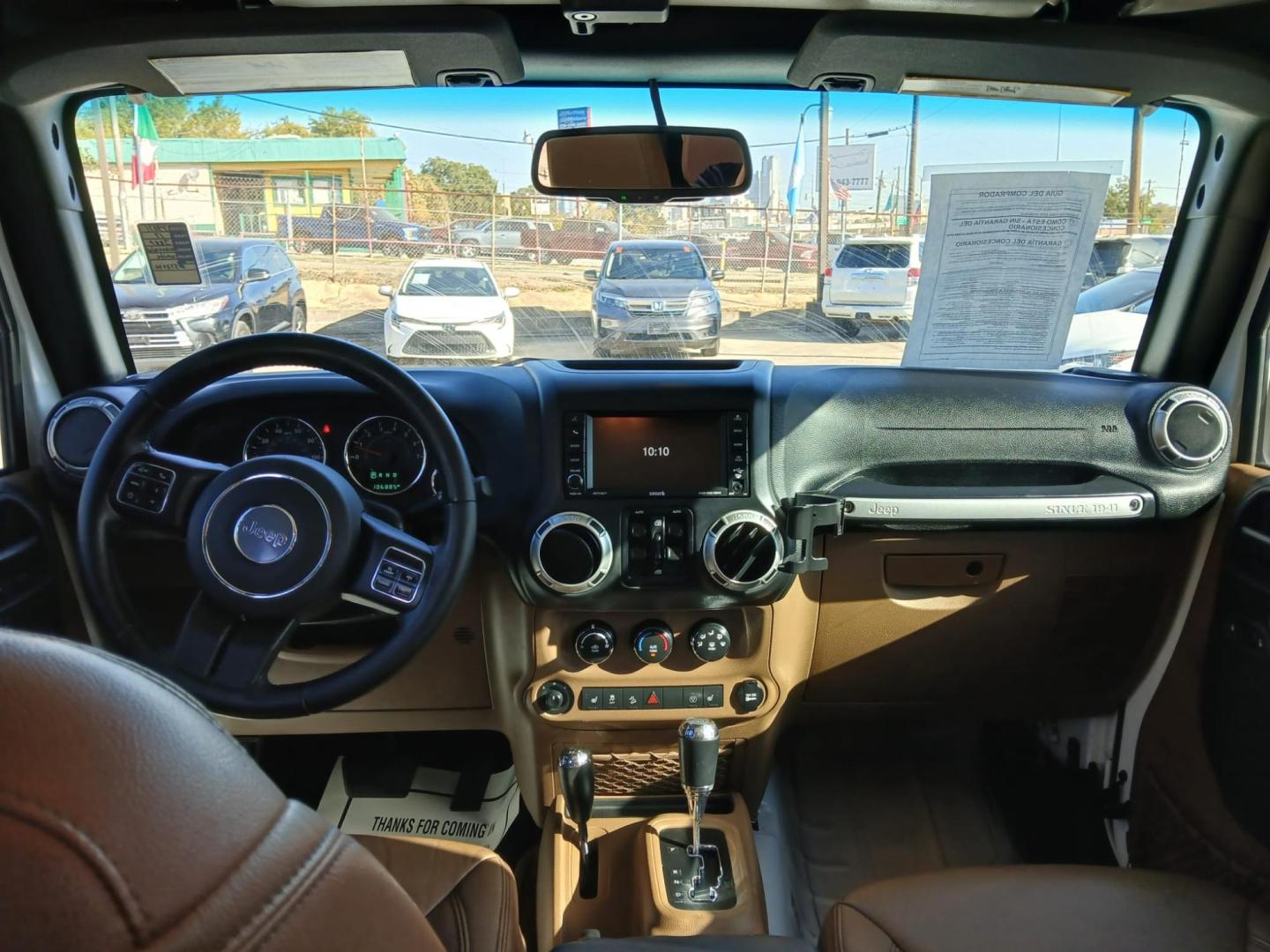 2017 white Jeep Wrangler Unlimited Sahara 4WD (1C4BJWEG2HL) with an 3.6L V6 DOHC 24V FFV engine, located at 945 E. Jefferson Blvd, Dallas, TX, 75203, (214) 943-7777, 32.752514, -96.811630 - Photo#4