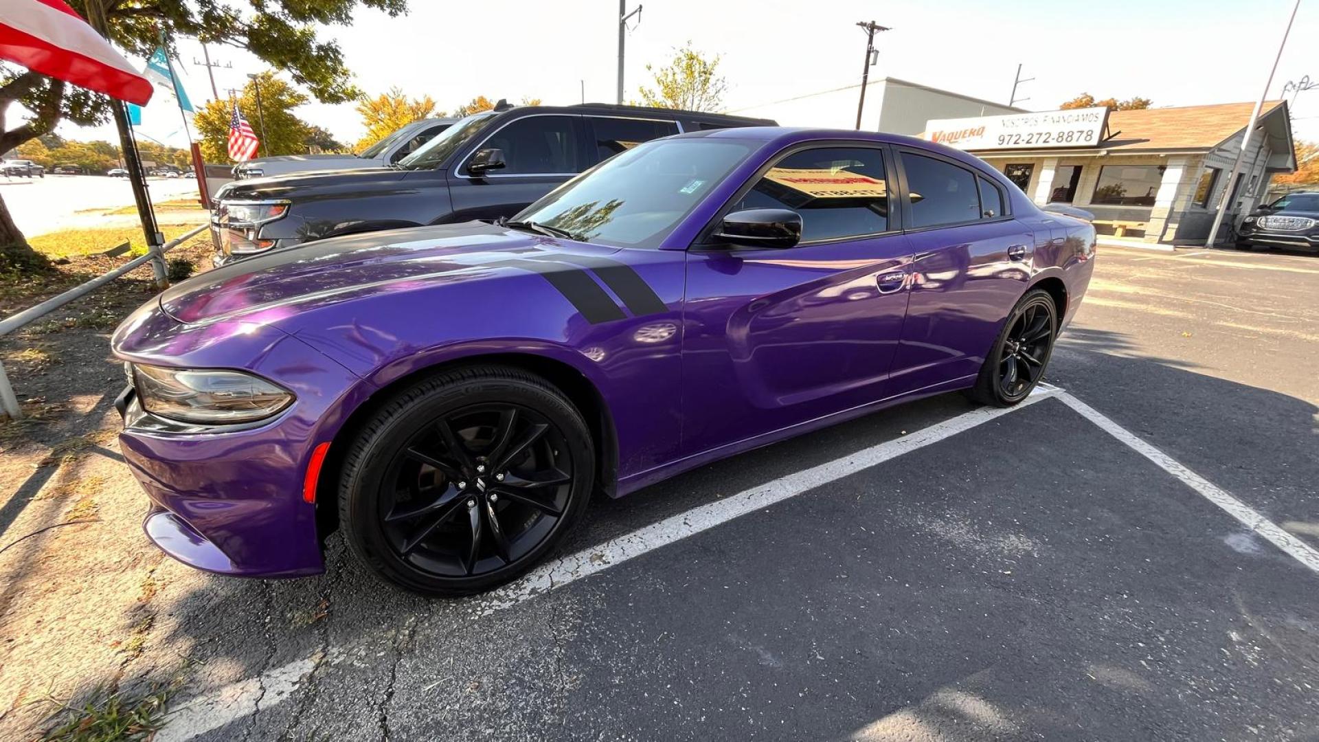 2018 Purple /Black Dodge Charger SE (2C3CDXBGXJH) with an 3.6L V6 DOHC 24V engine, 8A transmission, located at 945 E. Jefferson Blvd, Dallas, TX, 75203, (214) 943-7777, 32.752514, -96.811630 - Photo#0