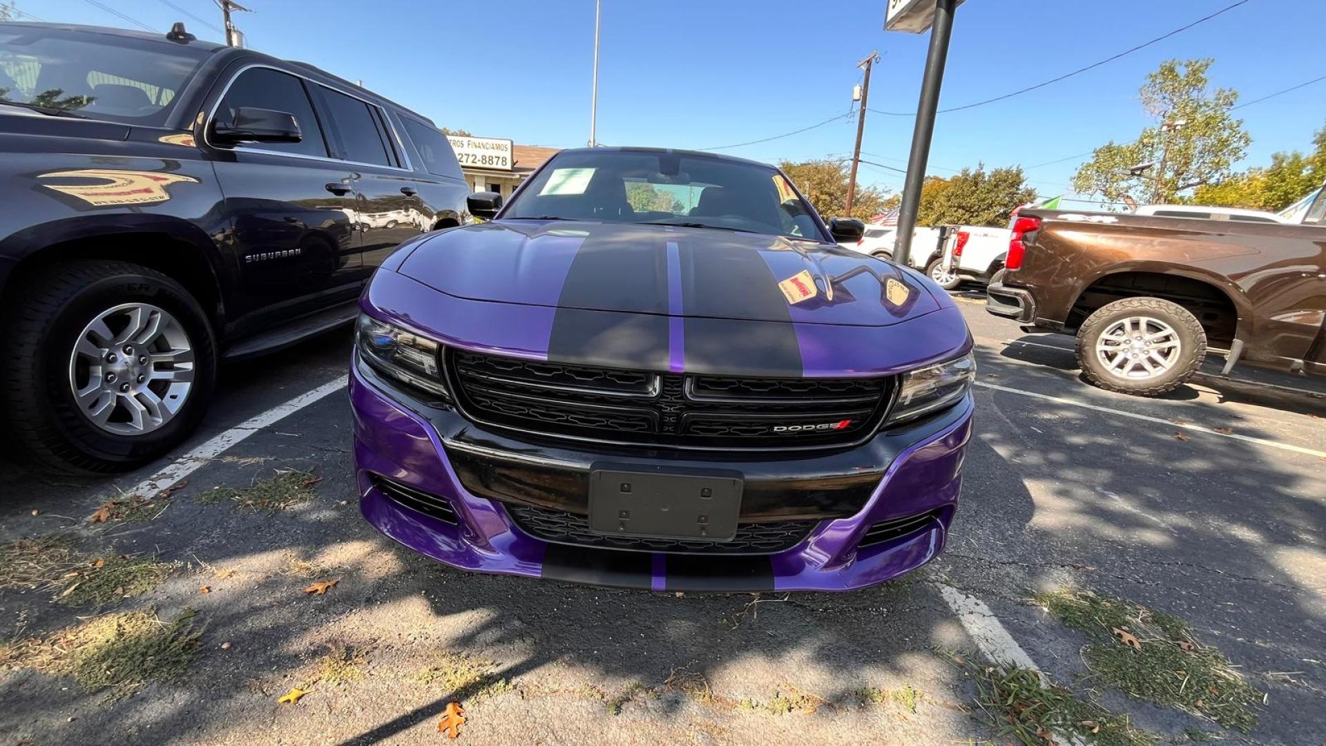 2018 Purple /Black Dodge Charger SE (2C3CDXBGXJH) with an 3.6L V6 DOHC 24V engine, 8A transmission, located at 945 E. Jefferson Blvd, Dallas, TX, 75203, (214) 943-7777, 32.752514, -96.811630 - Photo#1