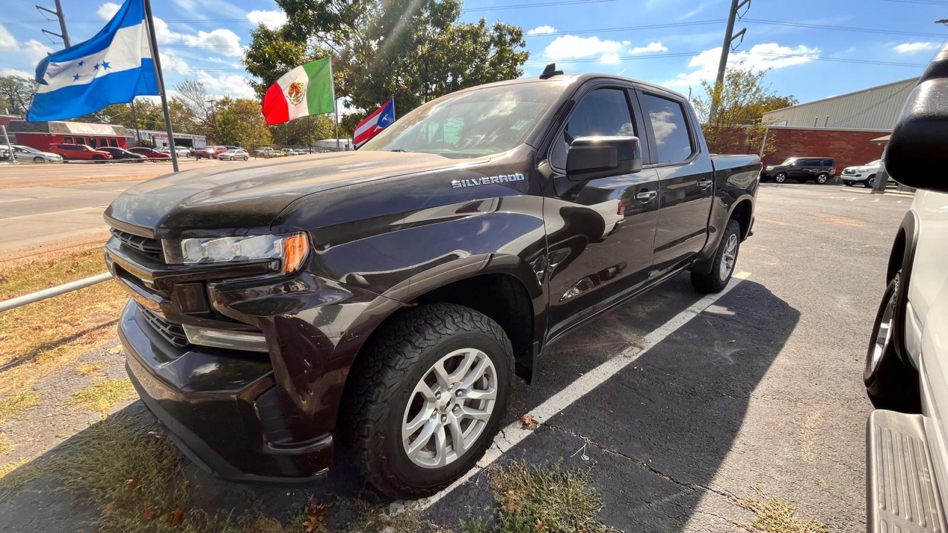 2019 Brown Chevrolet Silverado 1500 RST Crew Cab 4WD (1GCUYEED5KZ) with an 5.3L V8 OHV 16V engine, 6A transmission, located at 945 E. Jefferson Blvd, Dallas, TX, 75203, (214) 943-7777, 32.752514, -96.811630 - Photo#0