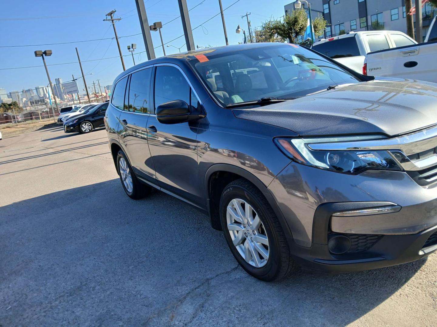 2019 Gray Honda Pilot LX 2WD (5FNYF5H17KB) with an 3.5L V6 SOHC 24V engine, 6A transmission, located at 945 E. Jefferson Blvd, Dallas, TX, 75203, (214) 943-7777, 32.752514, -96.811630 - Photo#2