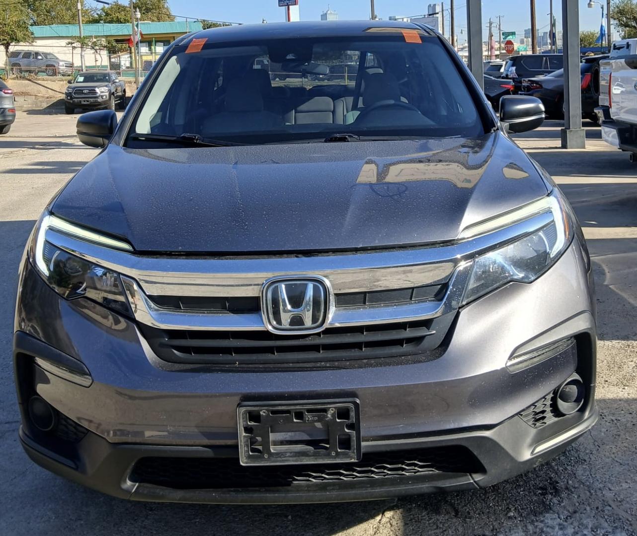 2019 Gray Honda Pilot LX 2WD (5FNYF5H17KB) with an 3.5L V6 SOHC 24V engine, 6A transmission, located at 945 E. Jefferson Blvd, Dallas, TX, 75203, (214) 943-7777, 32.752514, -96.811630 - Photo#1