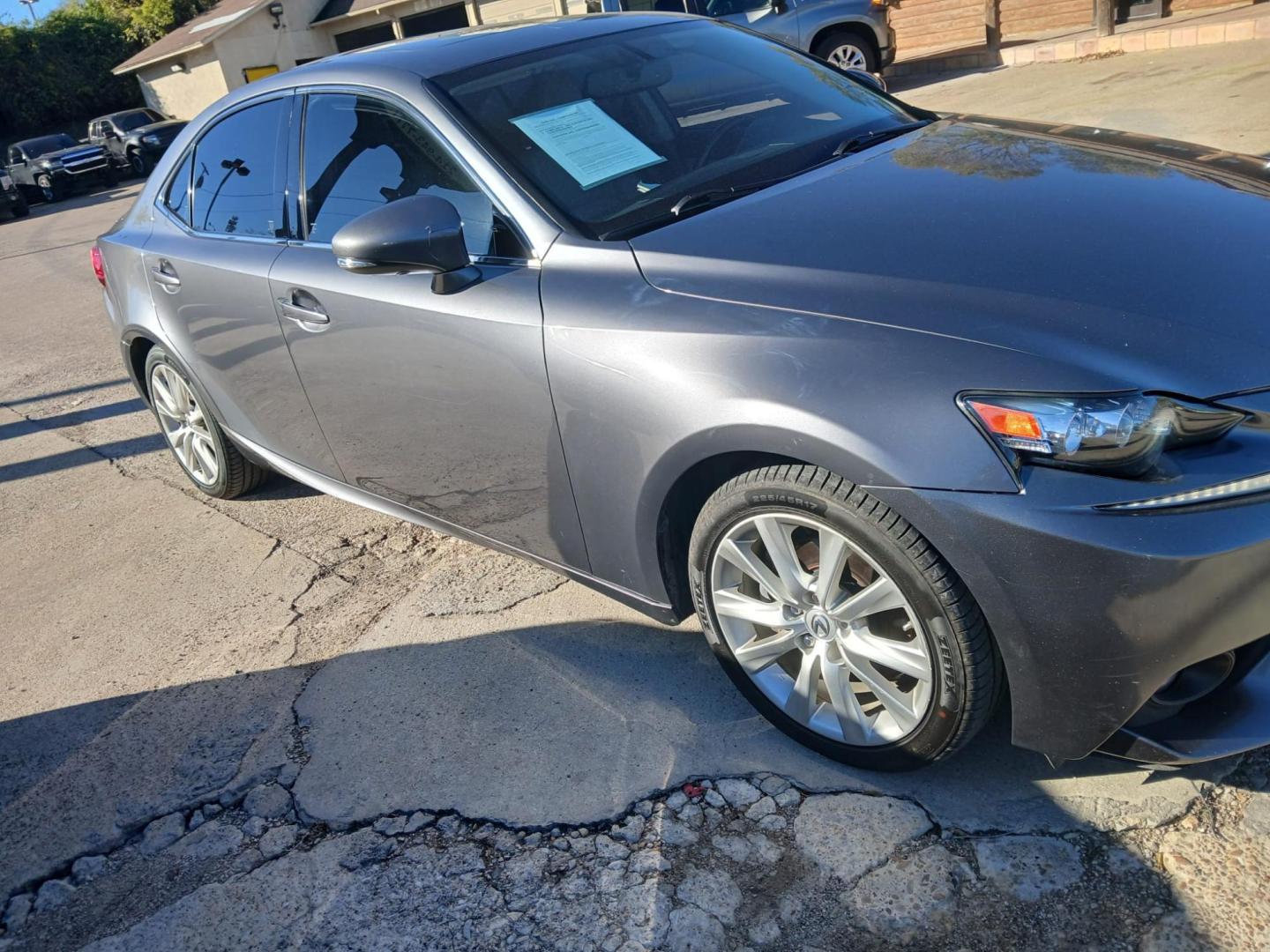 2015 Gray Lexus IS 250 RWD (JTHBF1D25F5) with an 2.5L V6 24V DOHC engine, 6-Speed Automatic transmission, located at 945 E. Jefferson Blvd, Dallas, TX, 75203, (214) 943-7777, 32.752514, -96.811630 - Photo#2