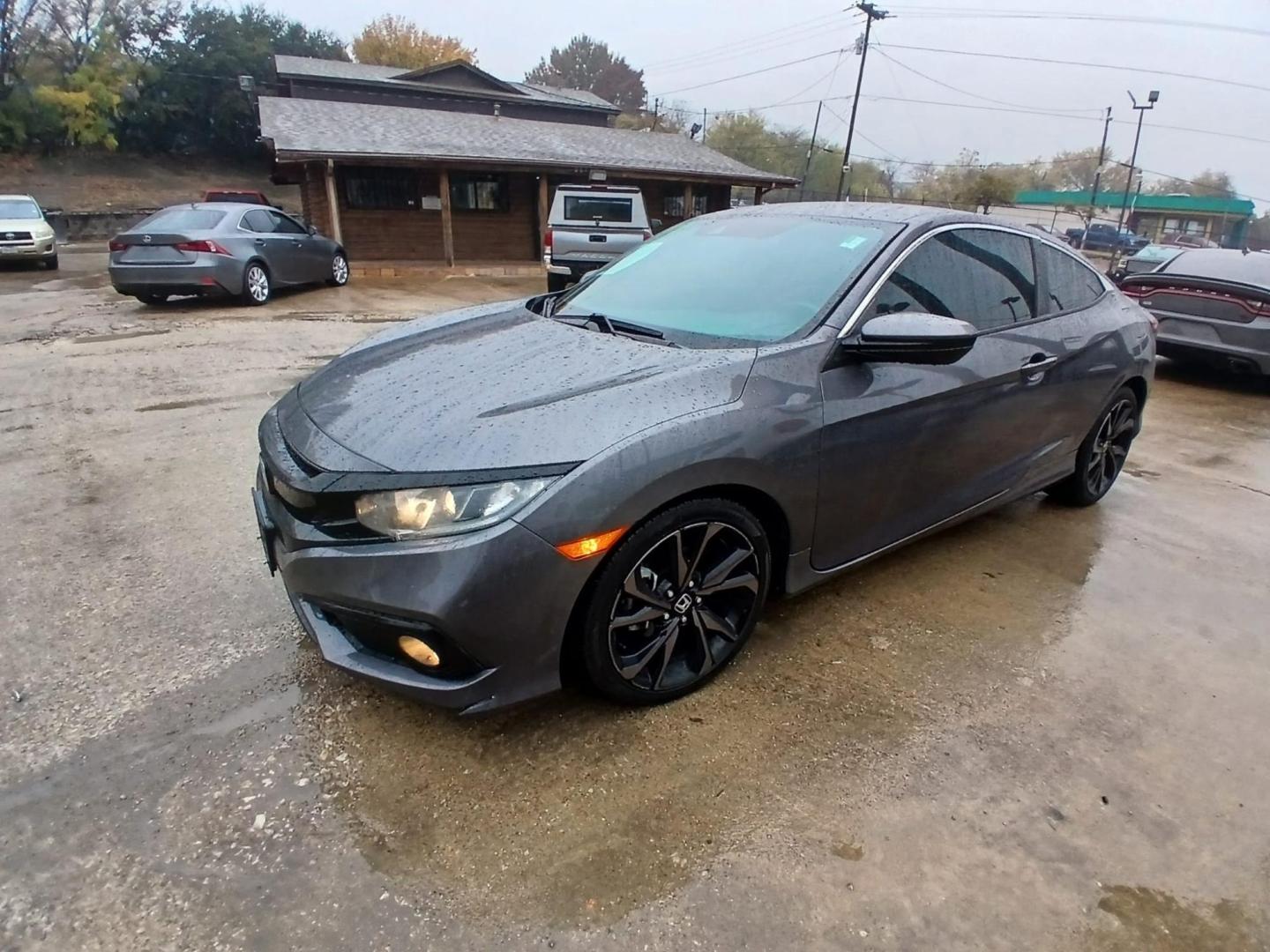 2019 Gray Honda Civic Sport Coupe CVT (2HGFC4B84KH) with an 2.0L L4 DOHC 16V engine, CVT transmission, located at 945 E. Jefferson Blvd, Dallas, TX, 75203, (214) 943-7777, 32.752514, -96.811630 - Photo#0