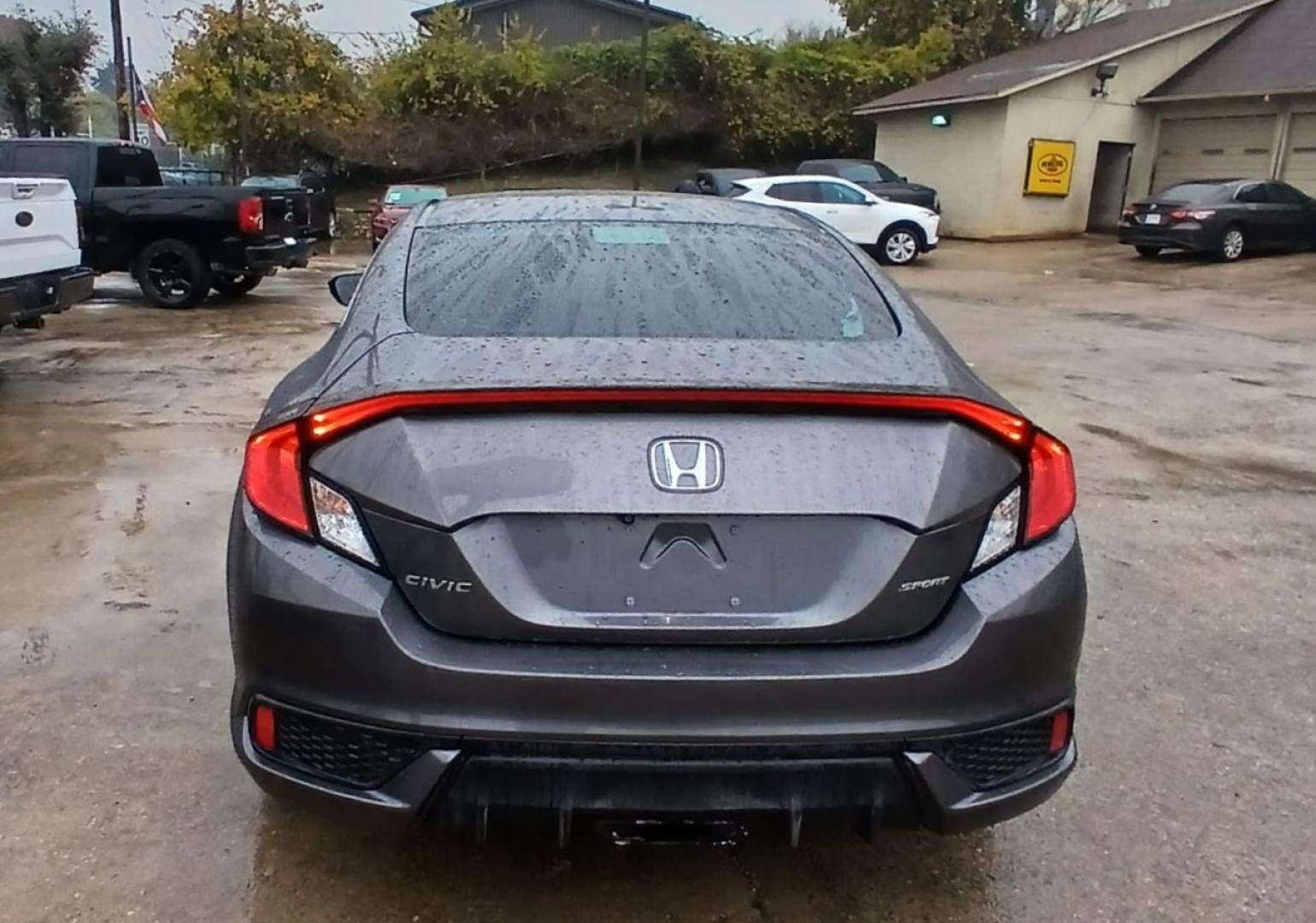 2019 Gray Honda Civic Sport Coupe CVT (2HGFC4B84KH) with an 2.0L L4 DOHC 16V engine, CVT transmission, located at 945 E. Jefferson Blvd, Dallas, TX, 75203, (214) 943-7777, 32.752514, -96.811630 - Photo#3