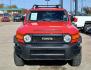 2012 Red Toyota FJ Cruiser 4WD MT (JTEBU4BF7CK) with an 3.4L V6 DOHC 24V engine, 6-Speed Manual transmission, located at 945 E. Jefferson Blvd, Dallas, TX, 75203, (214) 943-7777, 32.752514, -96.811630 - Photo#1